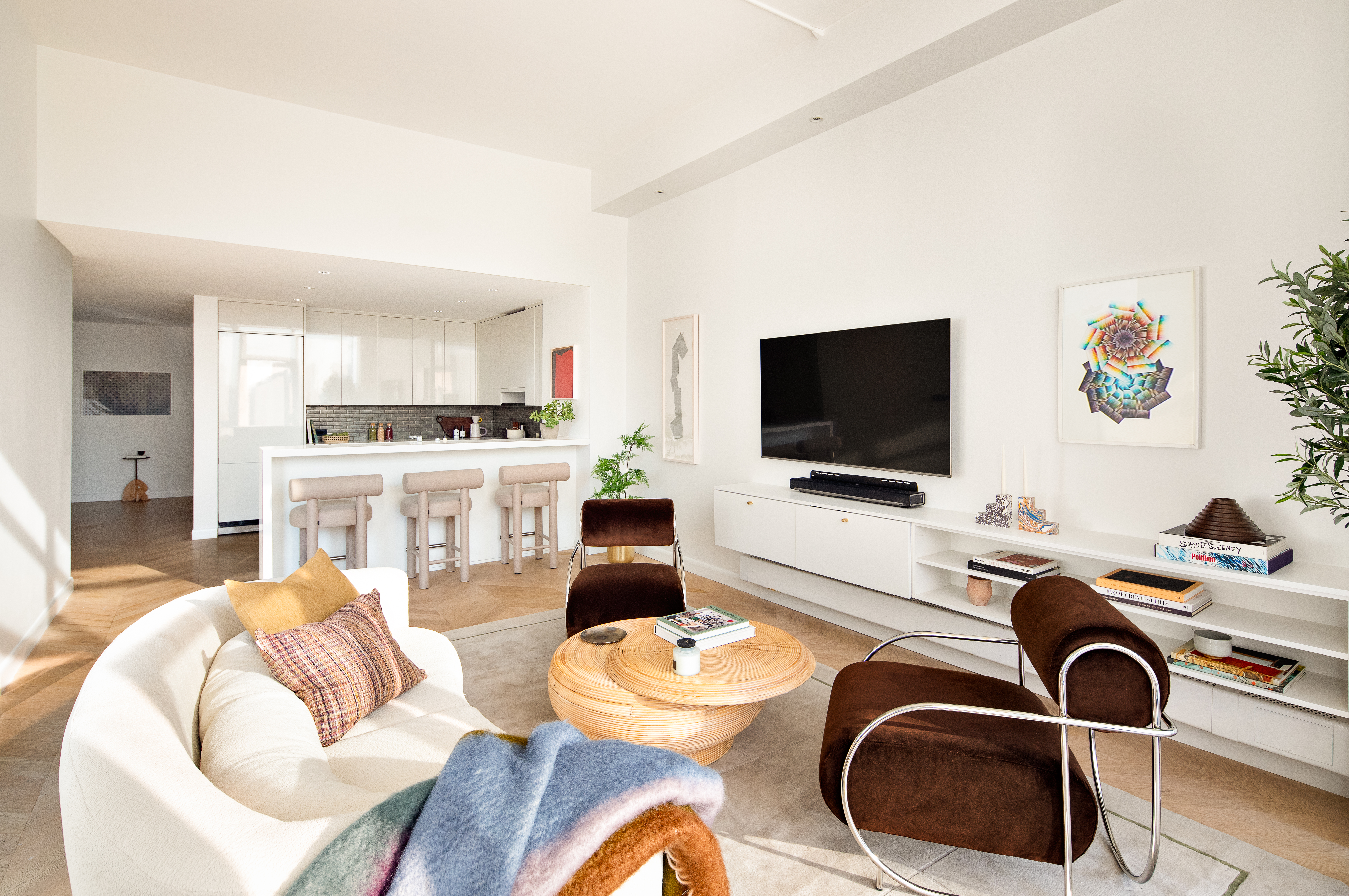 255 Hudson Street, Unit PHB Manhattan, NY 10013 - Photo 2 of 10 a living room with furniture and a flat screen tv