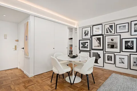 a view of a dining room with furniture