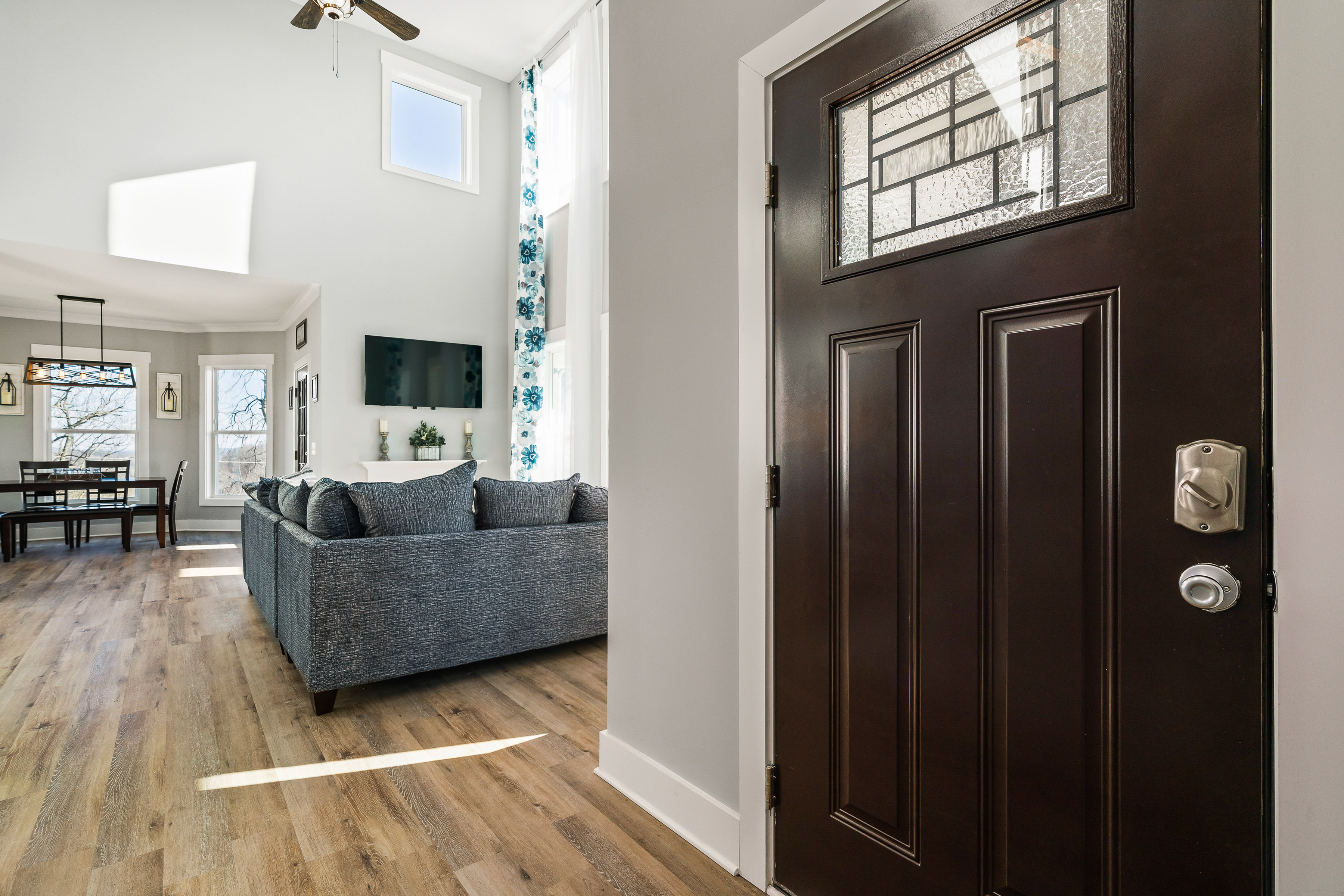 Happy Hollow Road Goodlettsville, TN 37072 - Photo 32 of 203 a living room with furniture a flat screen tv and a window