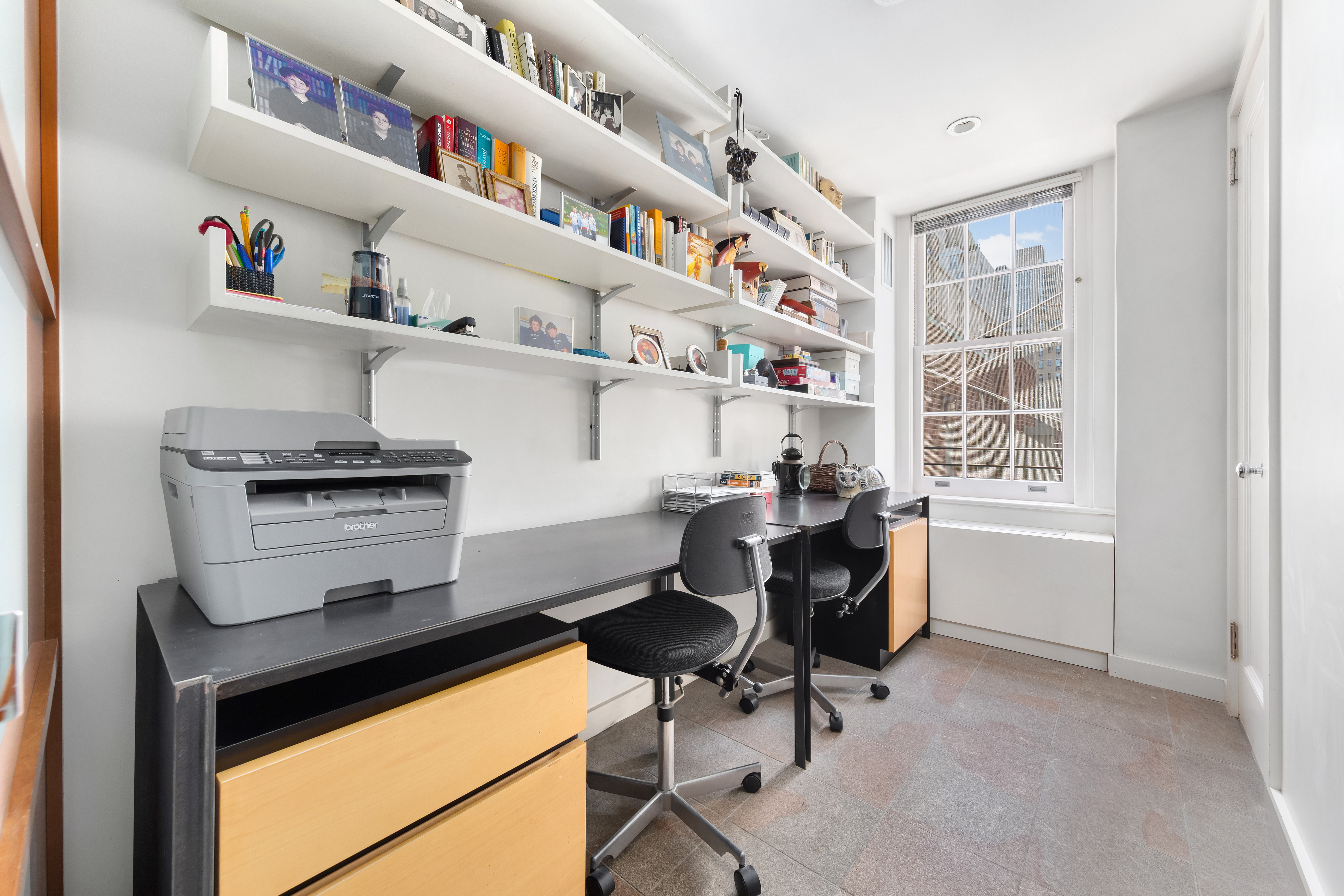 162 East 80th Street Manhattan, NY 10075 - Photo 11 of 13 a room with furniture and musical instruments