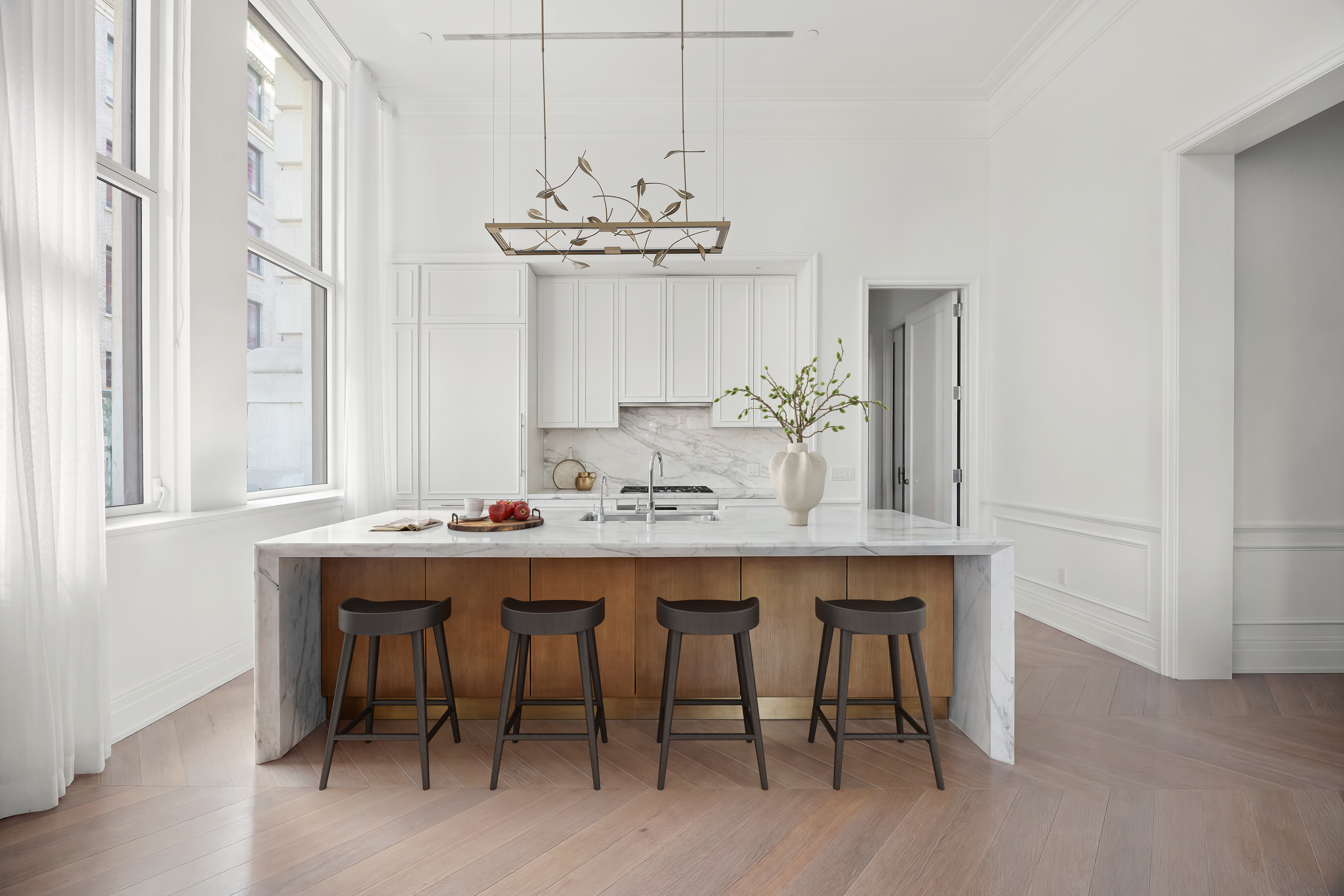 108 Leonard Street, Unit 5A Manhattan, NY 10013 - Photo 3 of 21 a view of a dining room with furniture wooden floor and chandelier