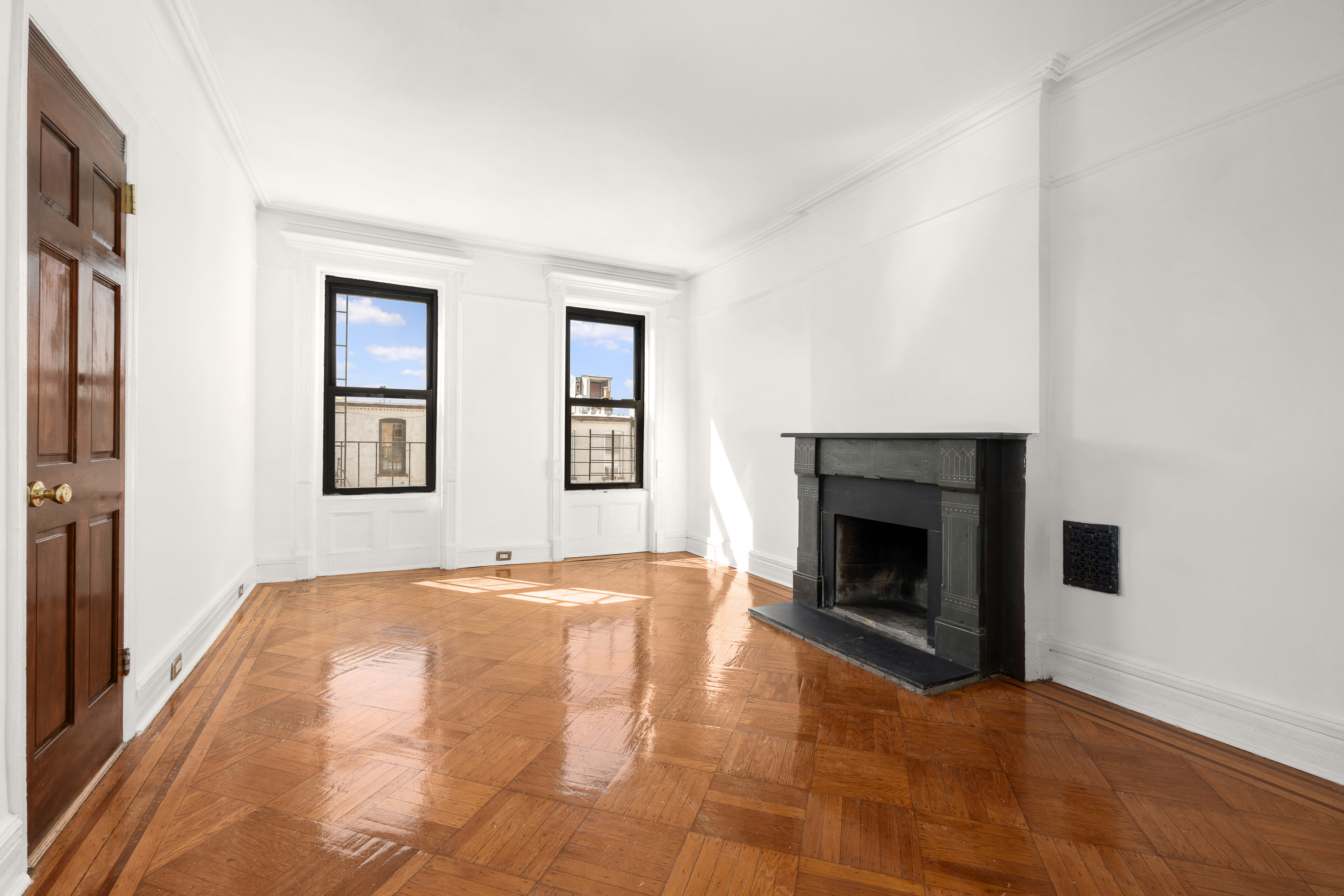 420 8th Street Brooklyn, NY 11215 - Photo 8 of 20 a view of empty room with a fireplace