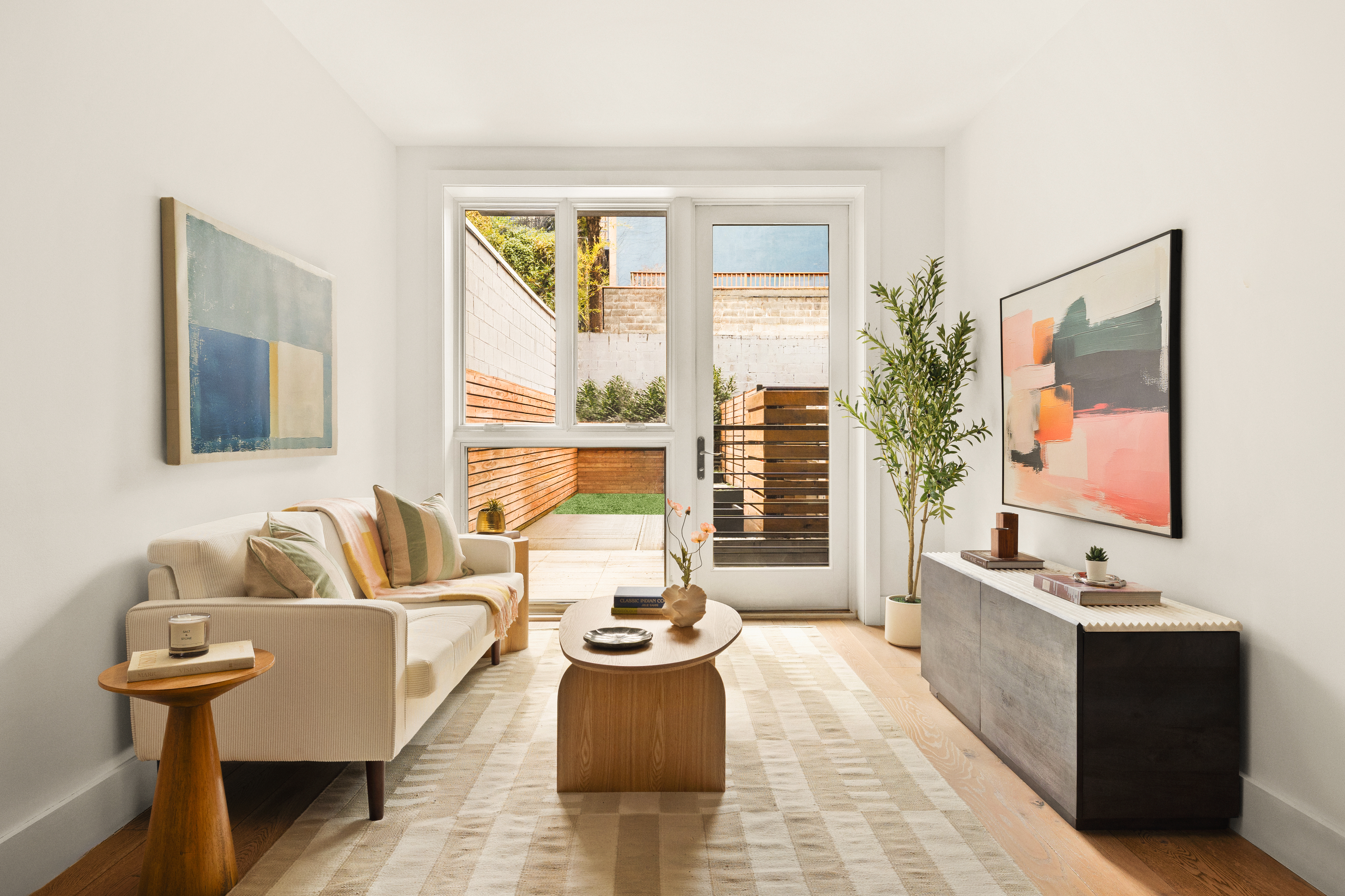 800 Dean Street, Unit GARDEN Brooklyn, NY 11238 - Photo 2 of 11 a living room with furniture and a flat screen tv
