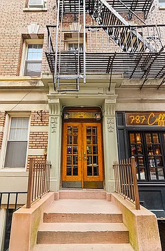 204 West 10th Street, Unit 18 Manhattan, NY 10014 - Photo 7 of 10 a view of a brick building with a window