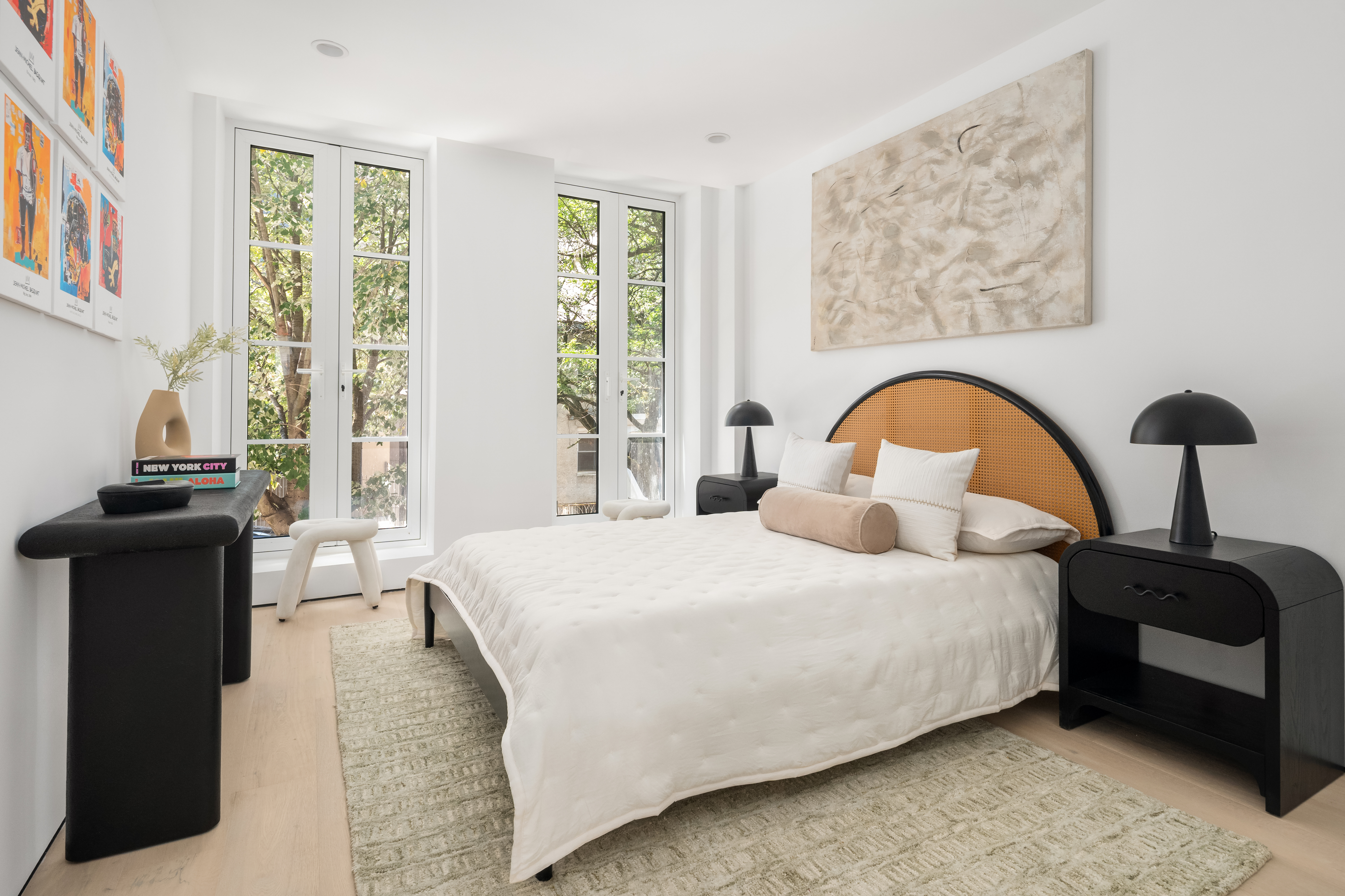 79 South 2nd Street Brooklyn, NY 11249 - Photo 10 of 14 a bedroom with a bed and wooden floor