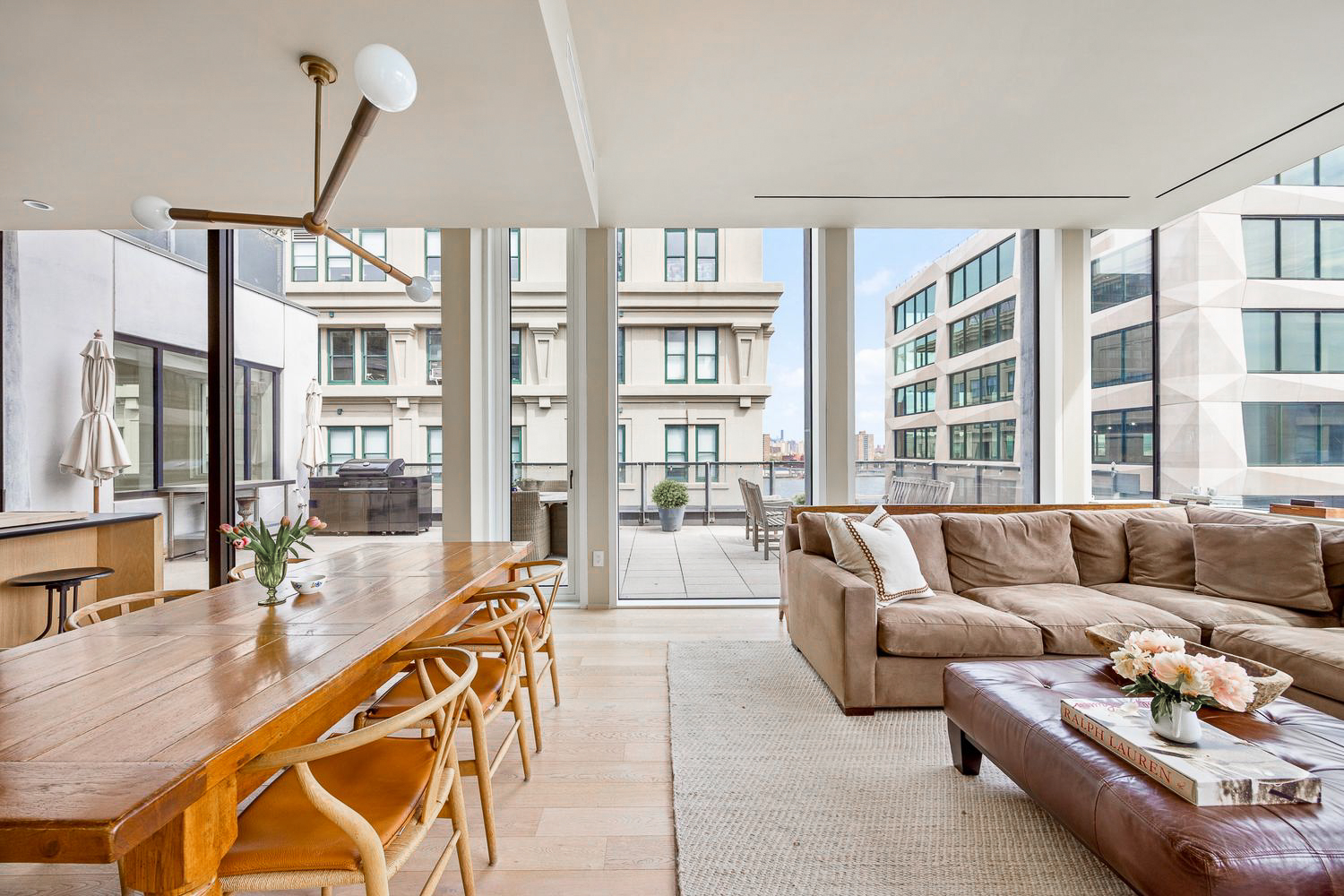168 Plymouth Street, Unit PHC Brooklyn, NY 11201 - Photo 4 of 19 a living room with furniture and floor to ceiling windows
