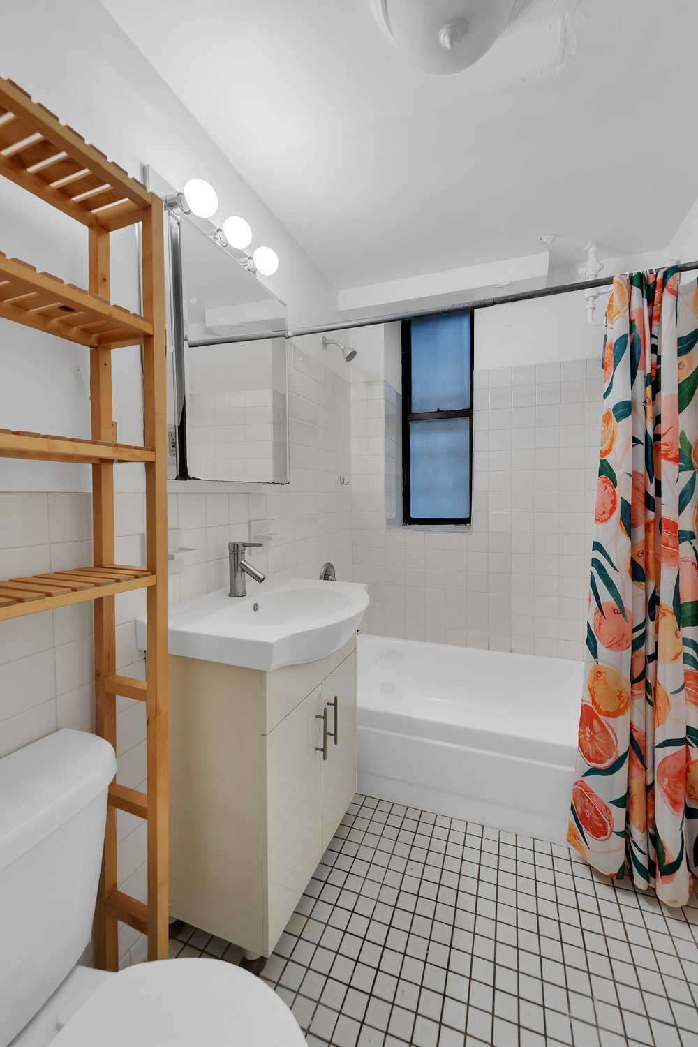 224 East 11th Street, Unit GARDEN Manhattan, NY 10003 - Photo 4 of 6 a bathroom with a sink a toilet and shower