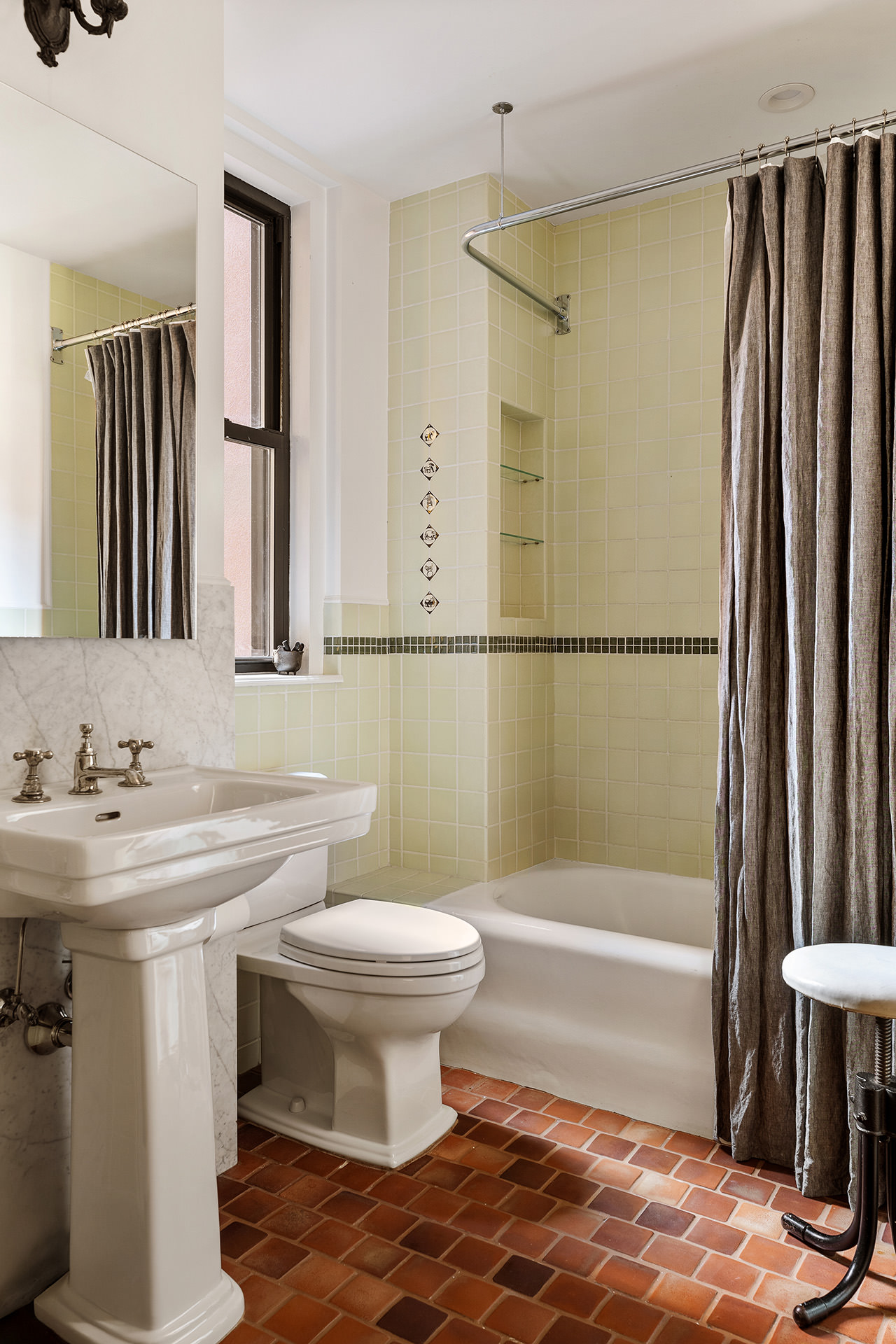 21 East 10th Street, Unit 7D Manhattan, NY 10003 - Photo 7 of 11 a bathroom with a sink toilet and shower