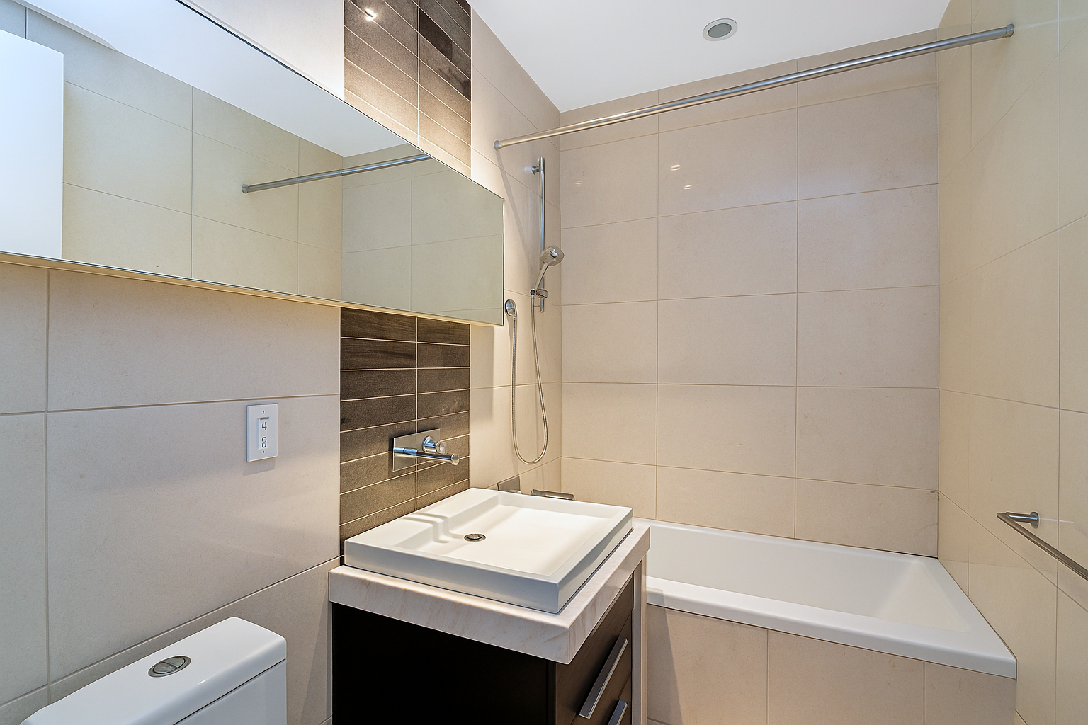 161 North 4th Street, Unit 1F Brooklyn, NY 11211 - Photo 5 of 10 a bathroom with a sink a toilet and shower