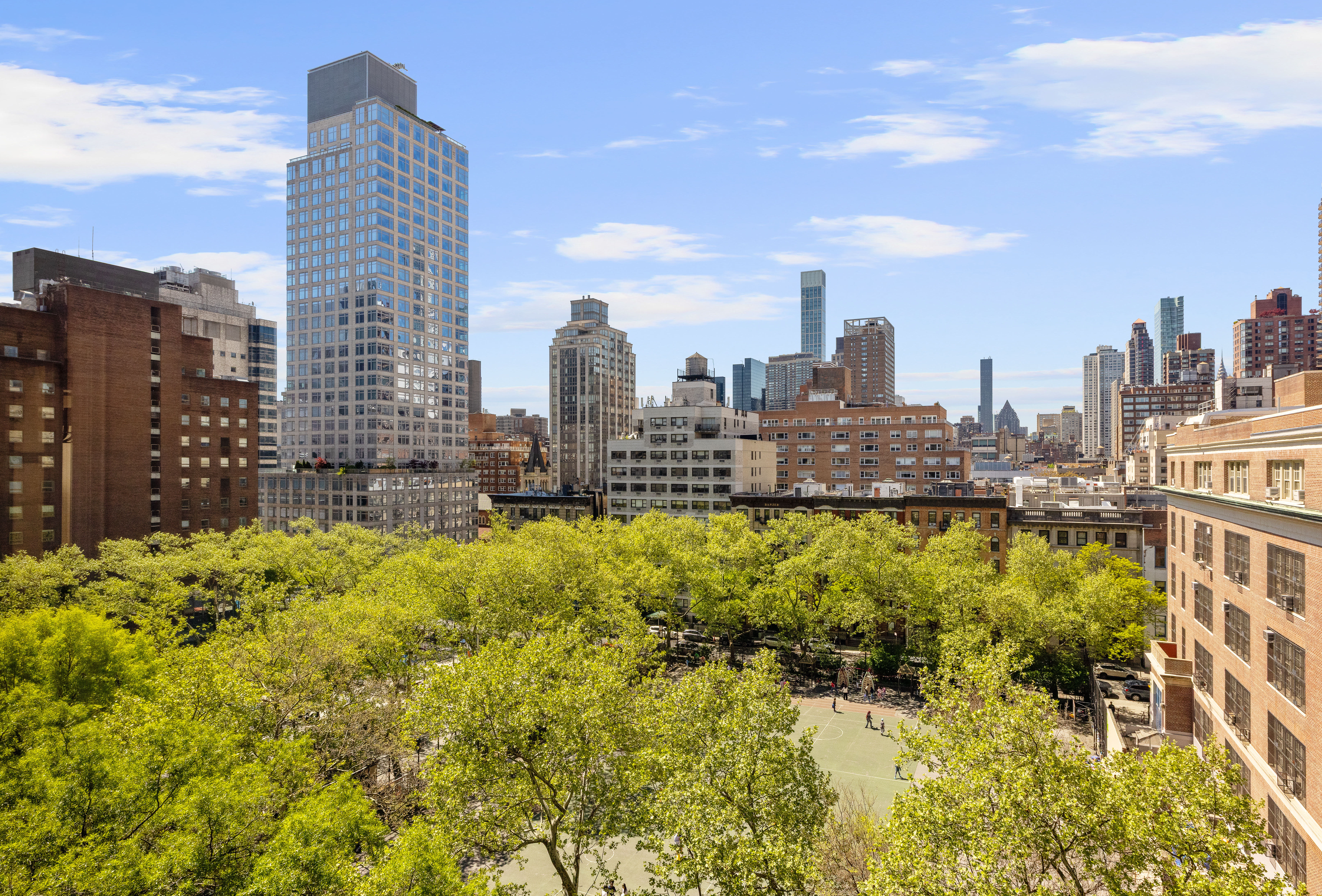 333 East 68th Street, Unit 8A Manhattan, NY 10065 - Photo 11 of 16 a view of a city with tall buildings