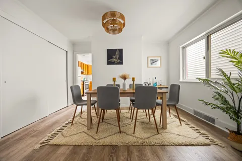 a view of a dining room with furniture