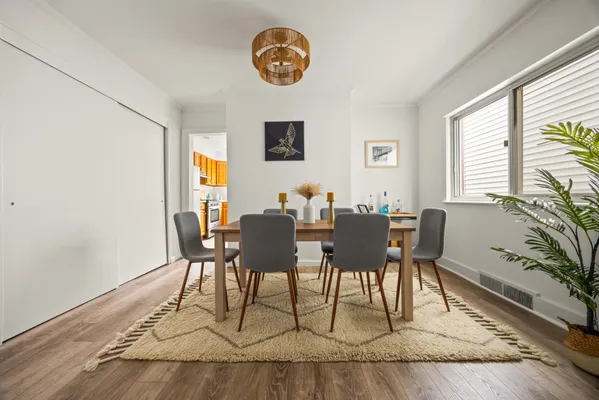 a view of a dining room with furniture