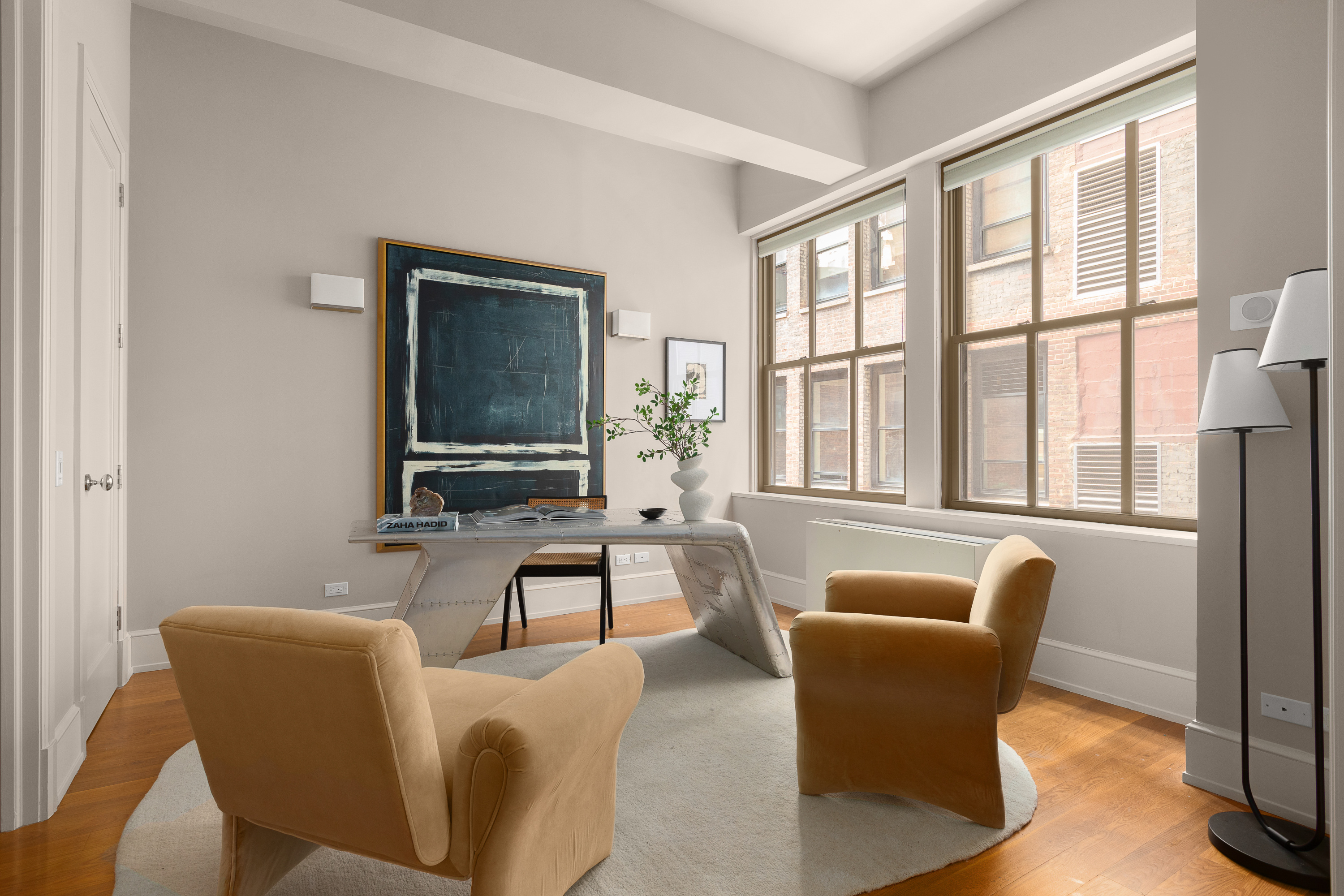 130 West 30th Street, Unit 4C Manhattan, NY 10001 - Photo 11 of 15 a living room with furniture and floor to ceiling windows