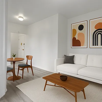 824 9th Avenue, Unit 5RN Manhattan, NY 10019 - Photo 3 of 11 a living room with furniture and a wooden floor