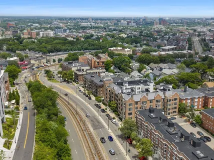 an aerial view of a city with lots of residential buildings