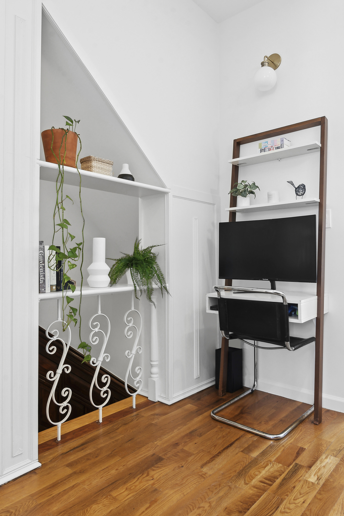 147 Herkimer Street Brooklyn, NY 11216 - Photo 10 of 25 a view of a livingroom with furniture and a potted plant