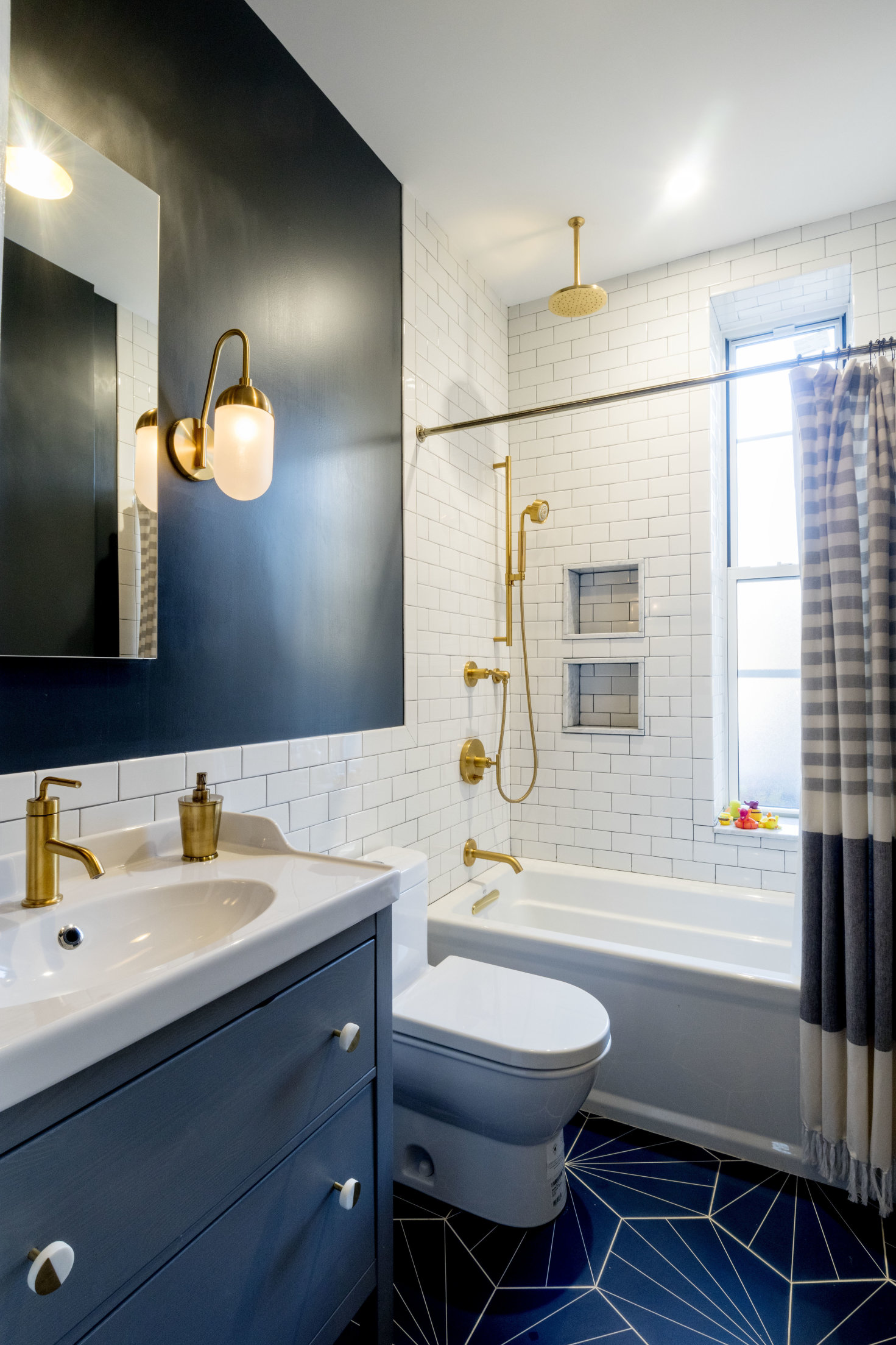 285 Empire Boulevard Brooklyn, NY 11225 - Photo 13 of 18 a bathroom with a sink a toilet and a mirror