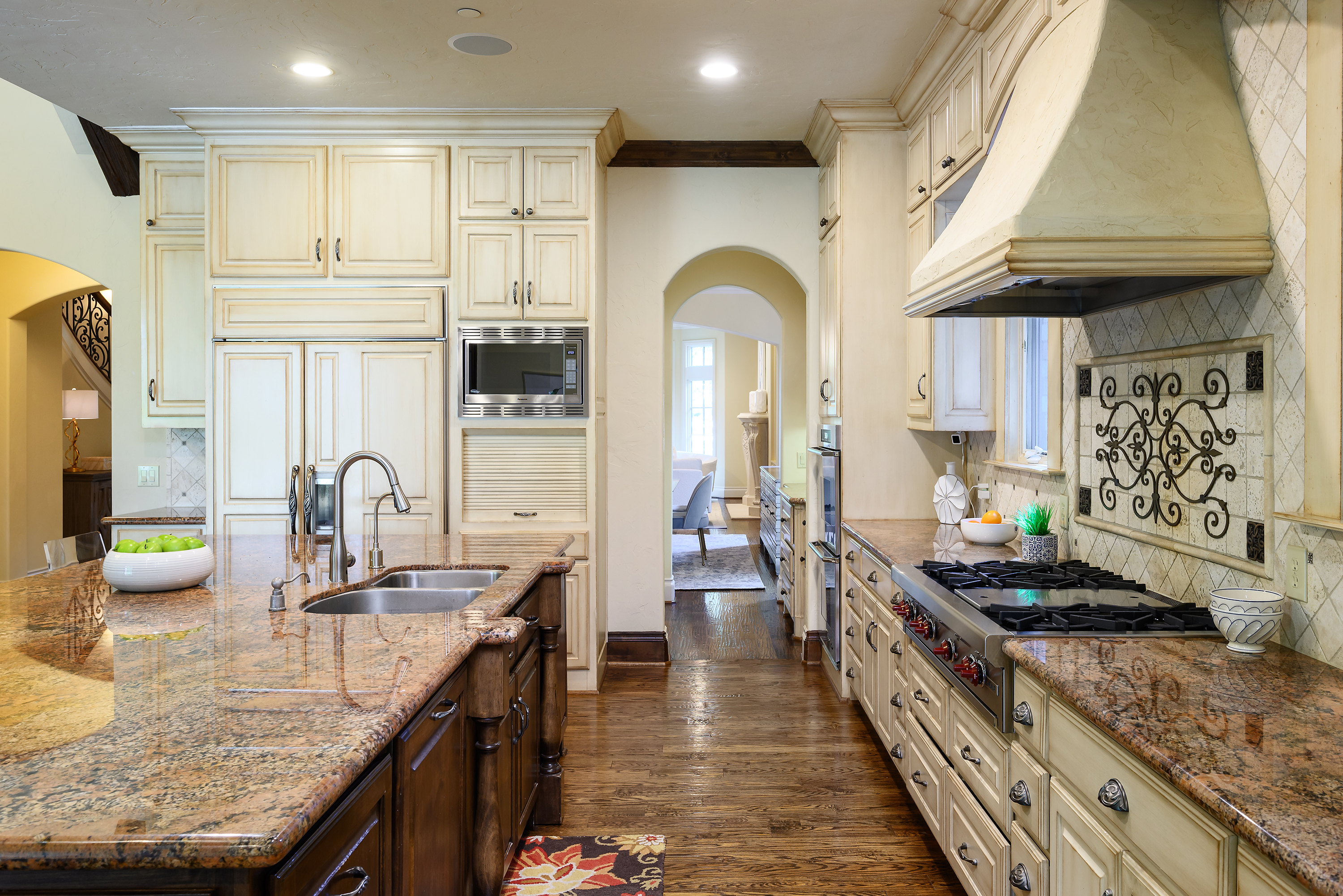 11503 West Ricks Circle Dallas, TX 75230 - Photo 17 of 39 a kitchen with stainless steel appliances granite countertop a stove a sink and a refrigerator