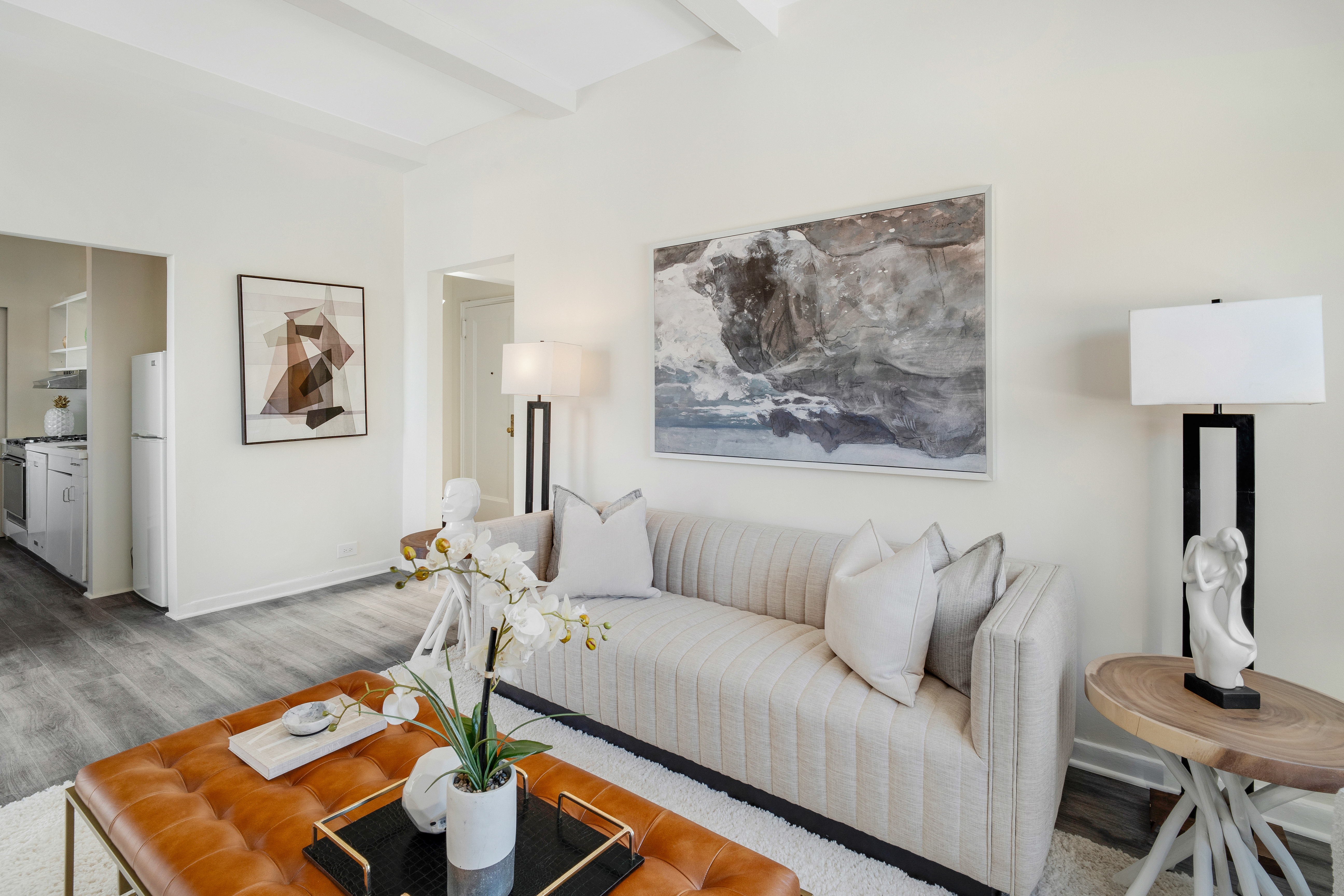 1349 Lexington Avenue, Unit PH2 Manhattan, NY 10128 - Photo 9 of 18 a living room with furniture and a wooden floor