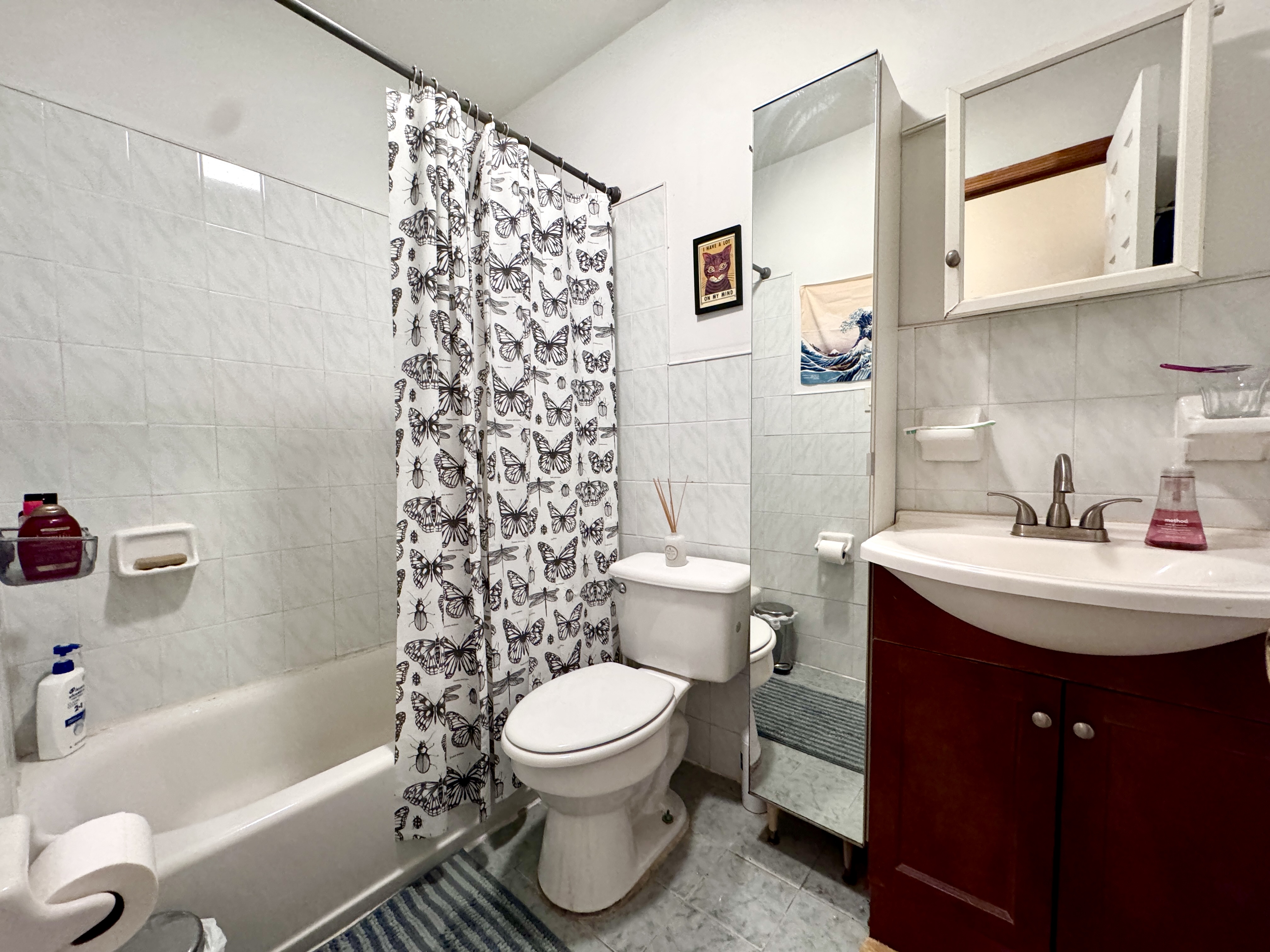 379 Baltic Street, Unit Undisclosed Brooklyn, NY 11201 - Photo 9 of 10 a bathroom with a sink toilet and shower