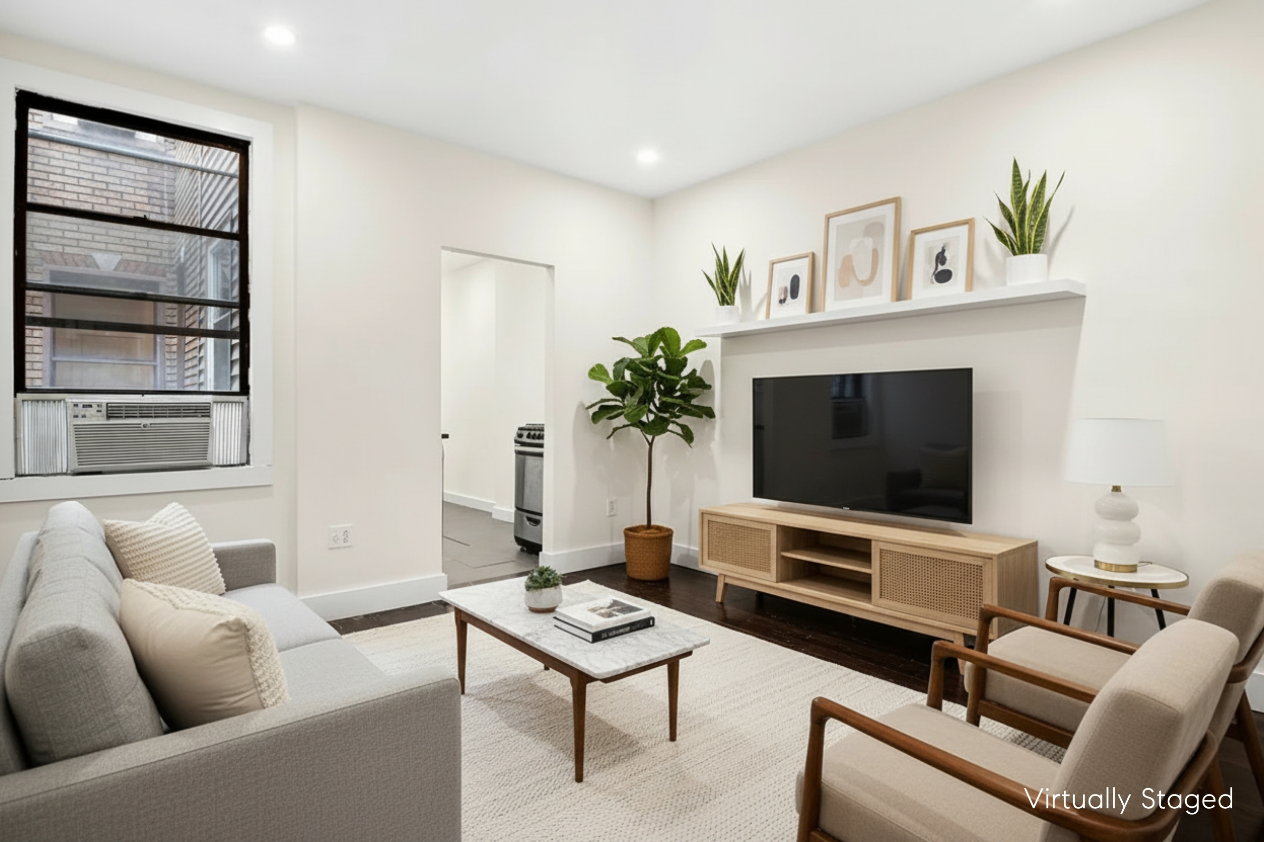 22-42 41st Street, Unit 2R Queens, NY 11105 - Photo 1 of 10 a living room with furniture and a flat screen tv