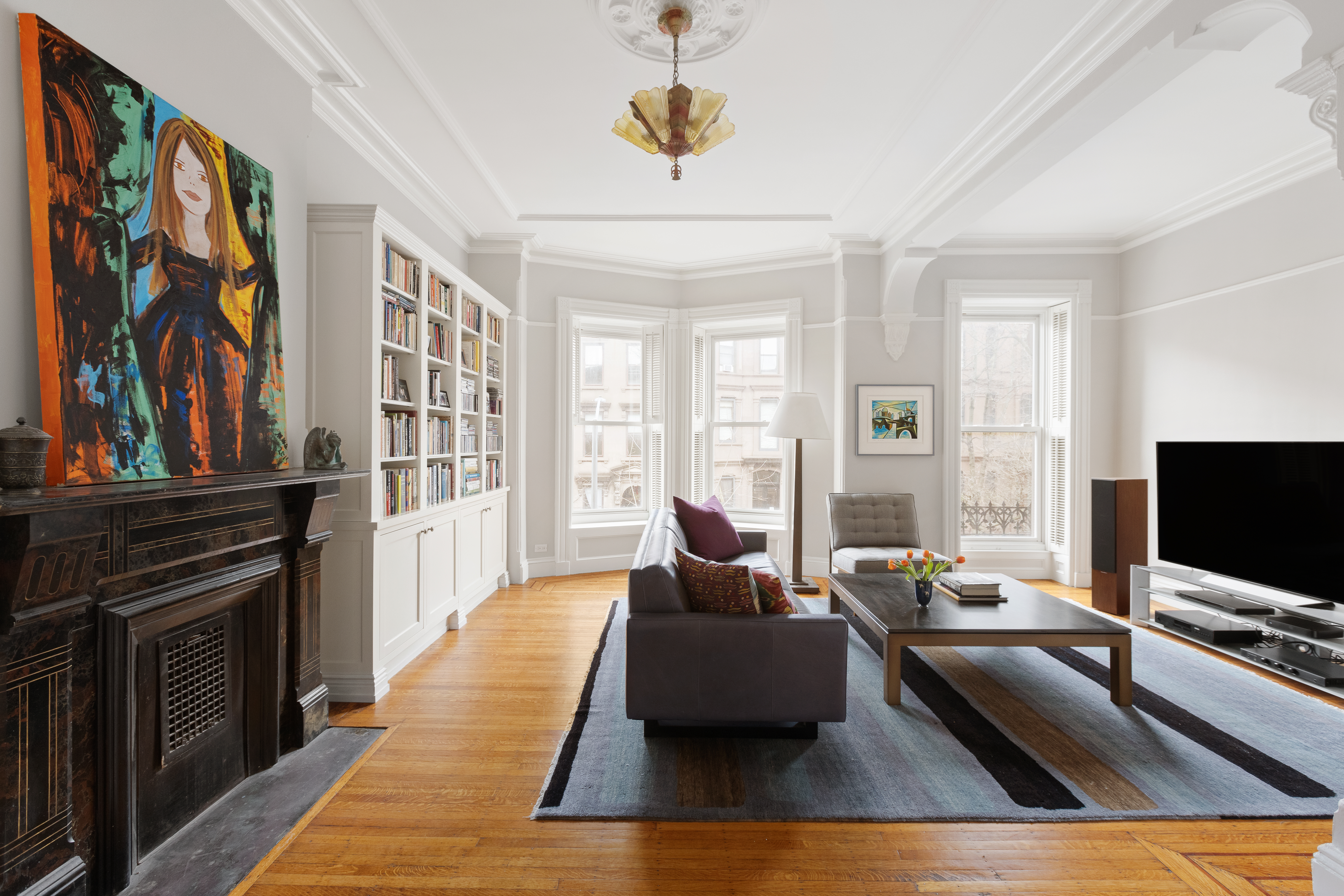 196 Berkeley Place Brooklyn, NY 11217 - Photo 12 of 25 a living room with furniture and a flat screen tv