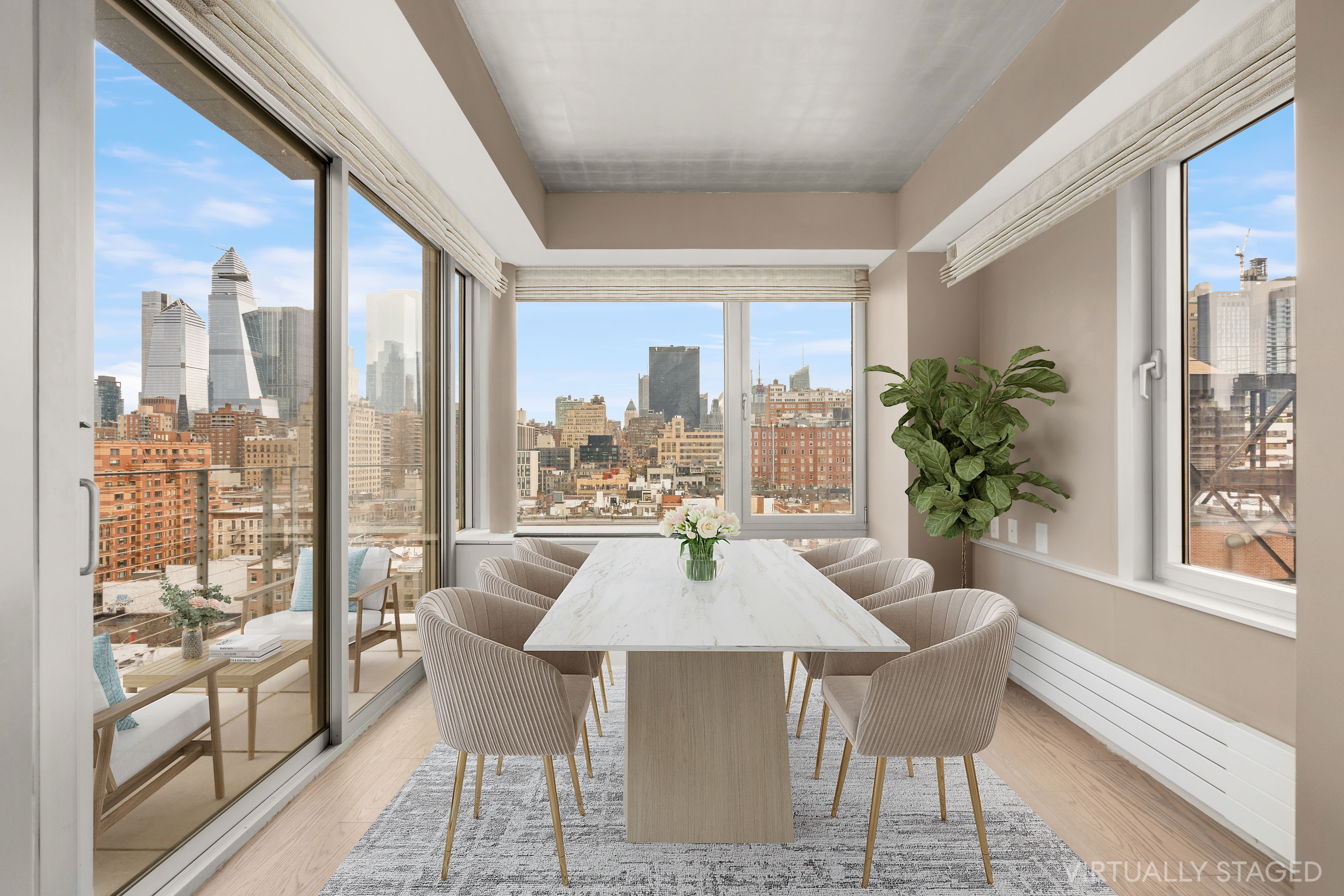 245 West 19th Street, Unit PH4 Manhattan, NY 10011 - Photo 3 of 13 a view of a dining room with furniture window and wooden floor