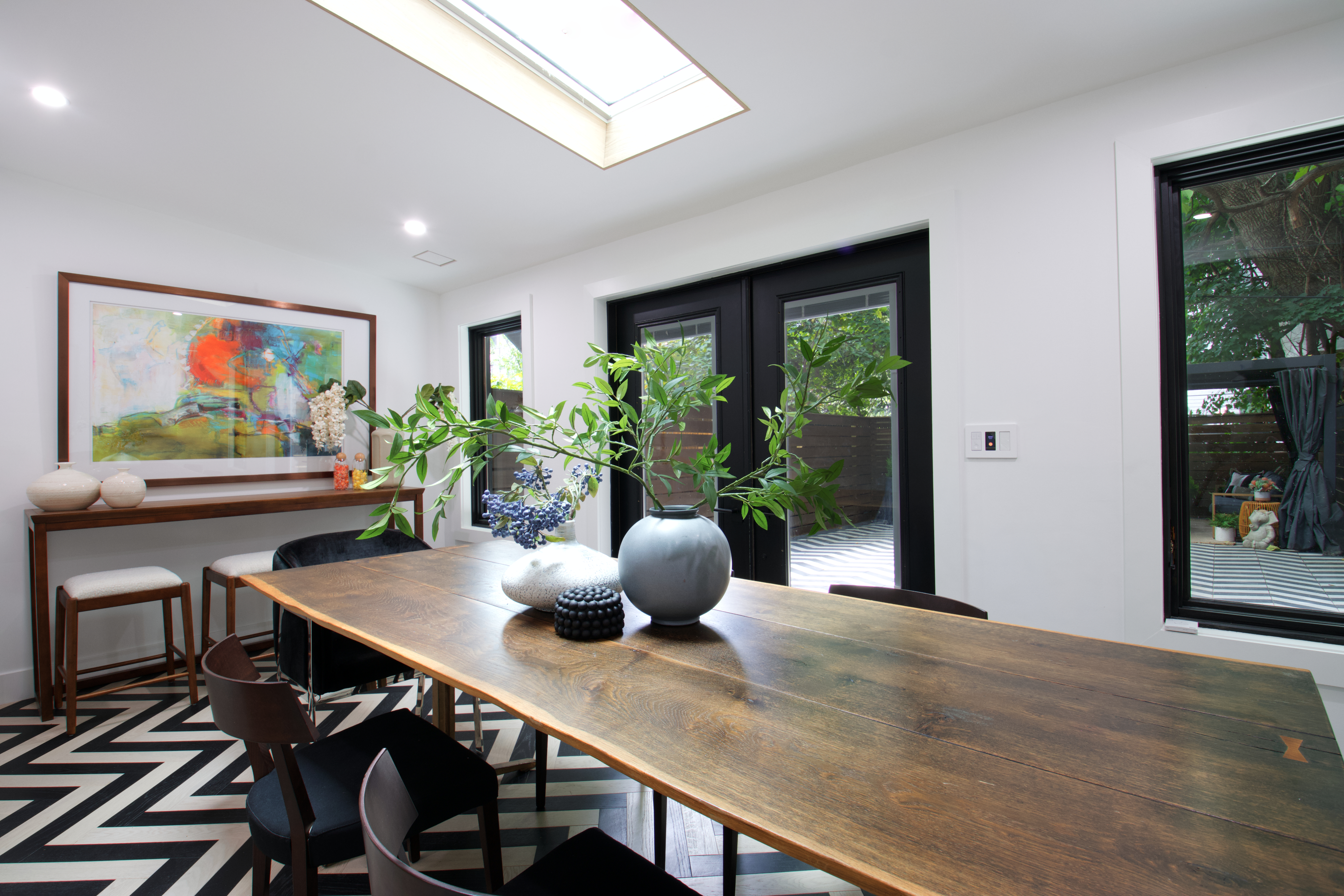 255 Macon Street Brooklyn, NY 11216 - Photo 6 of 36 a dining room with furniture a potted plant and windows