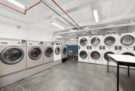 a view of parking garage with cars