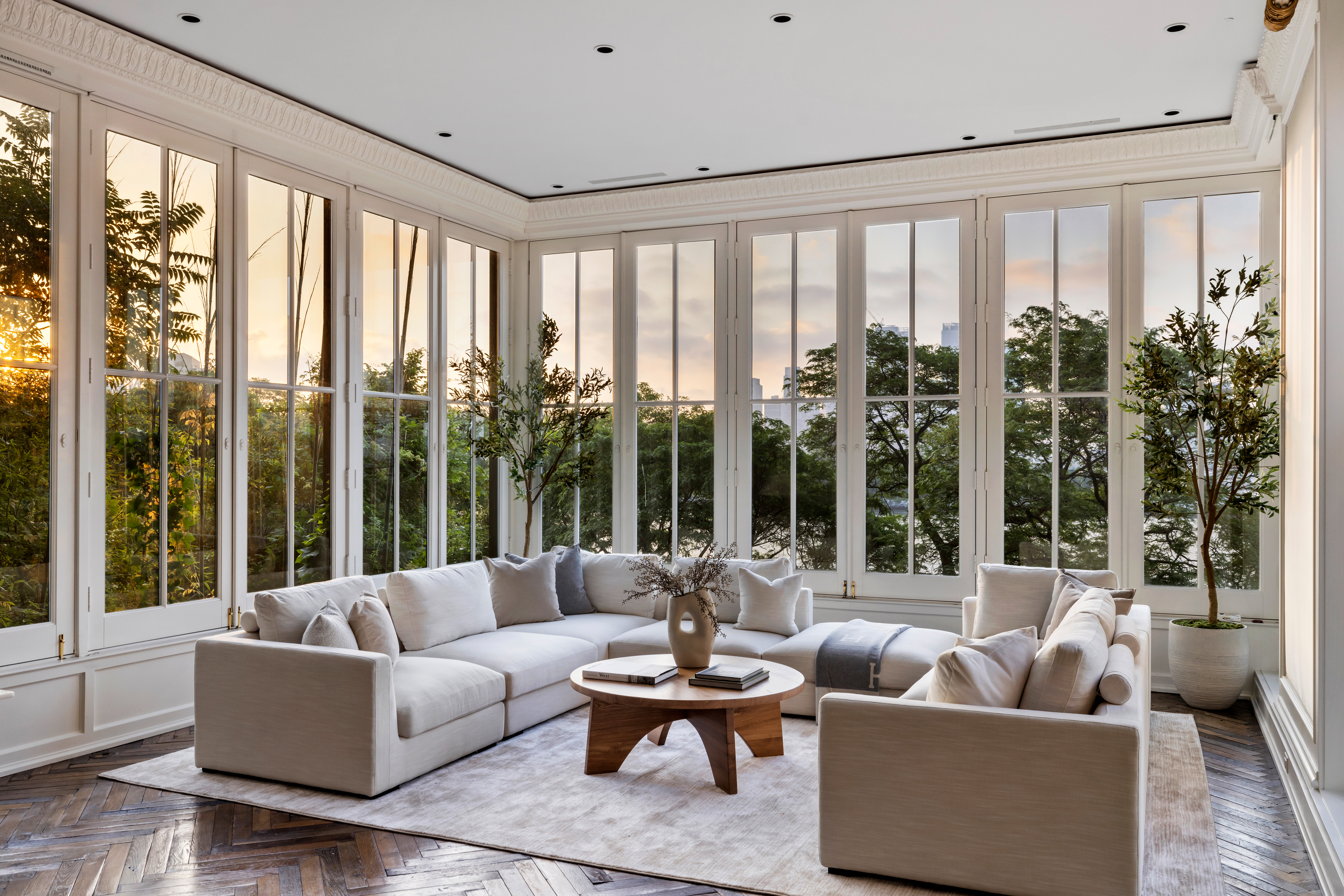 21 Beekman Place Manhattan, NY 10022 - Photo 4 of 16 a living room with furniture and a large window
