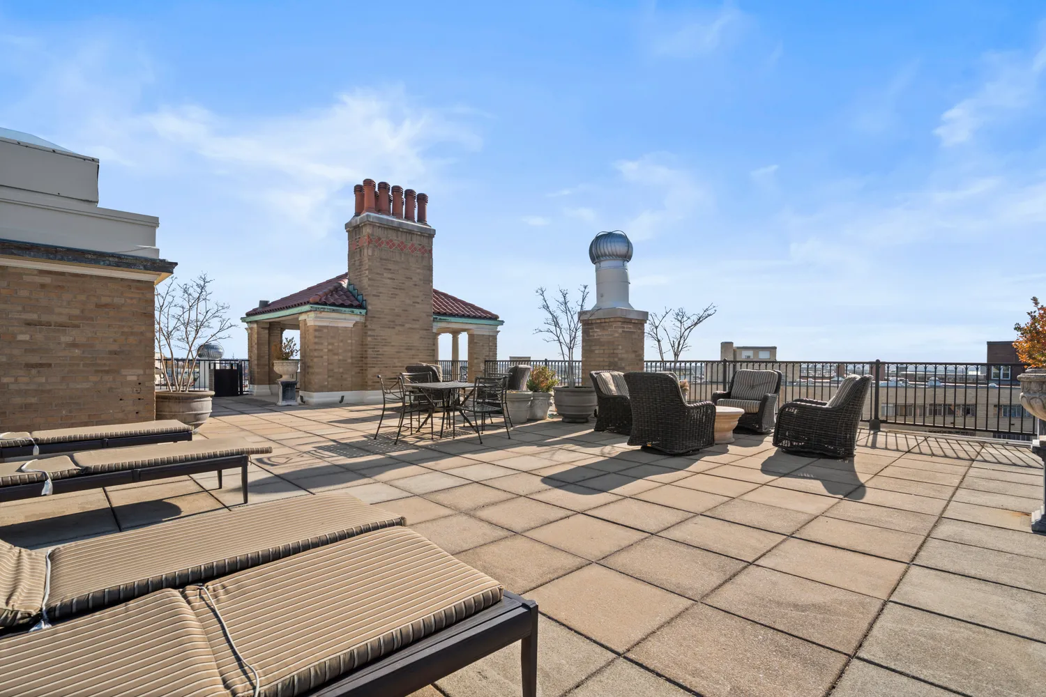 a view of a terrace with chairs