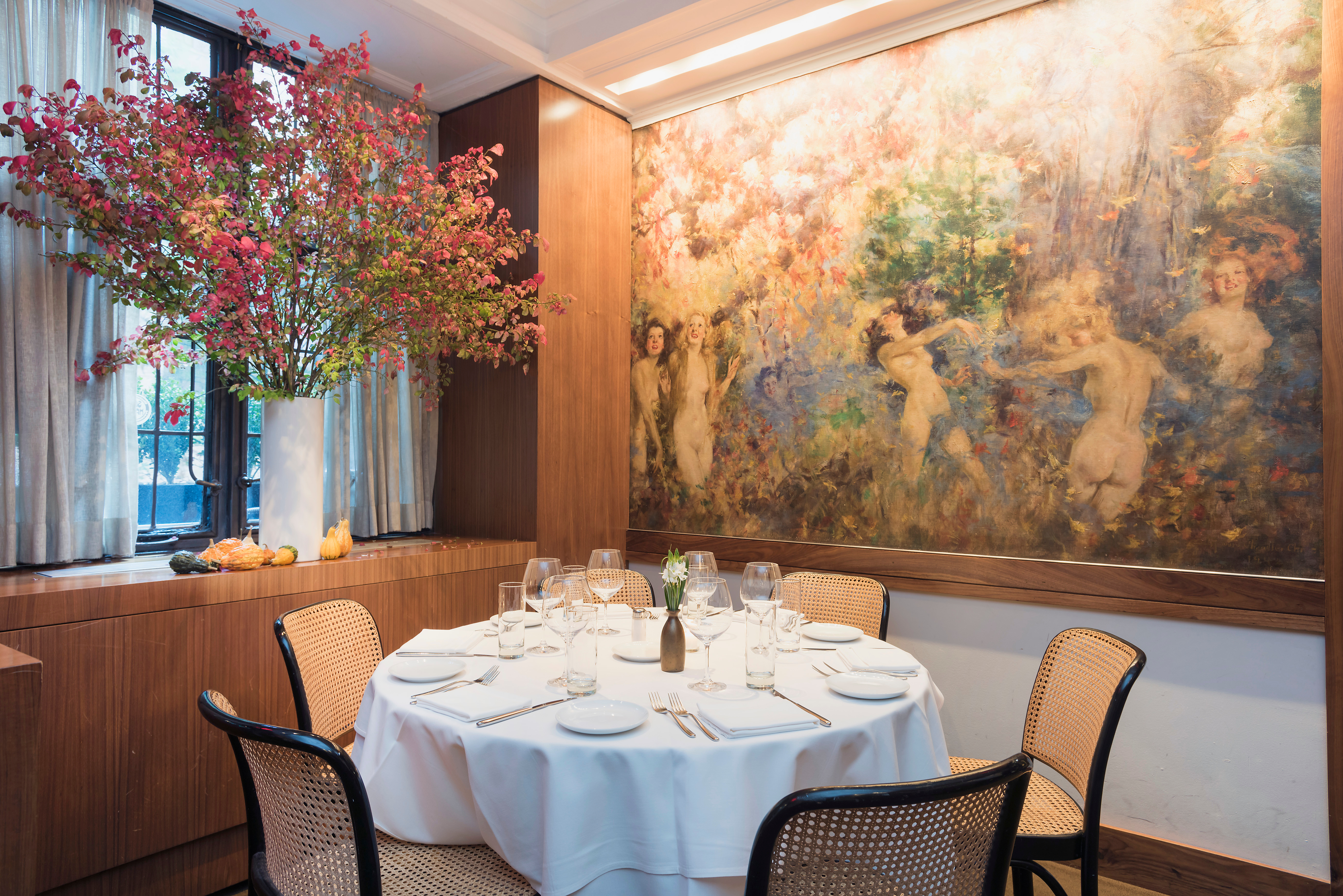 1 West 67th Street, Unit 501/502 Manhattan, NY 10023 - Photo 18 of 19 a dining room with furniture and wooden floor