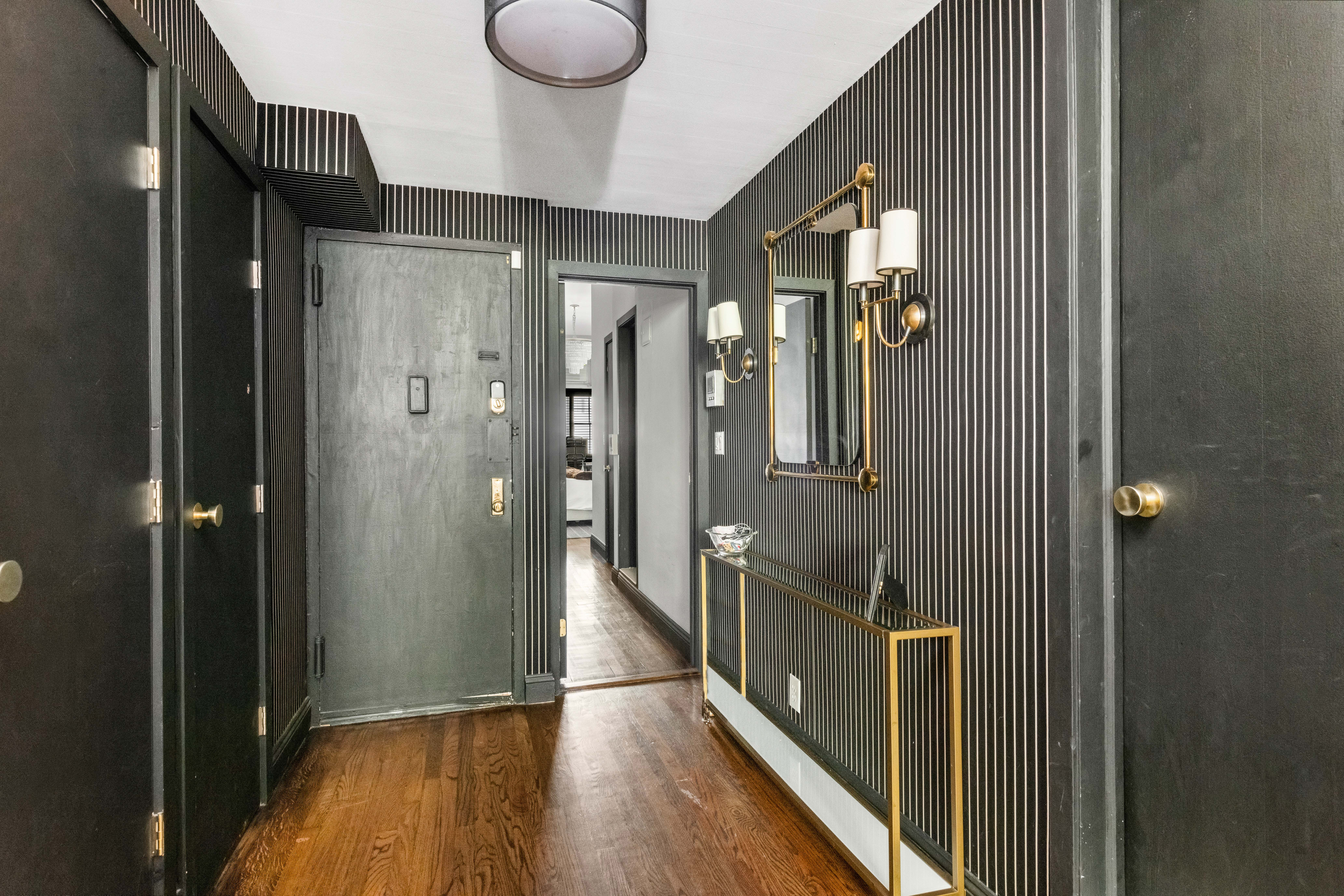 21 West 9th Street, Unit 1F Manhattan, NY 10011 - Photo 8 of 11 a view of hallway with stairs