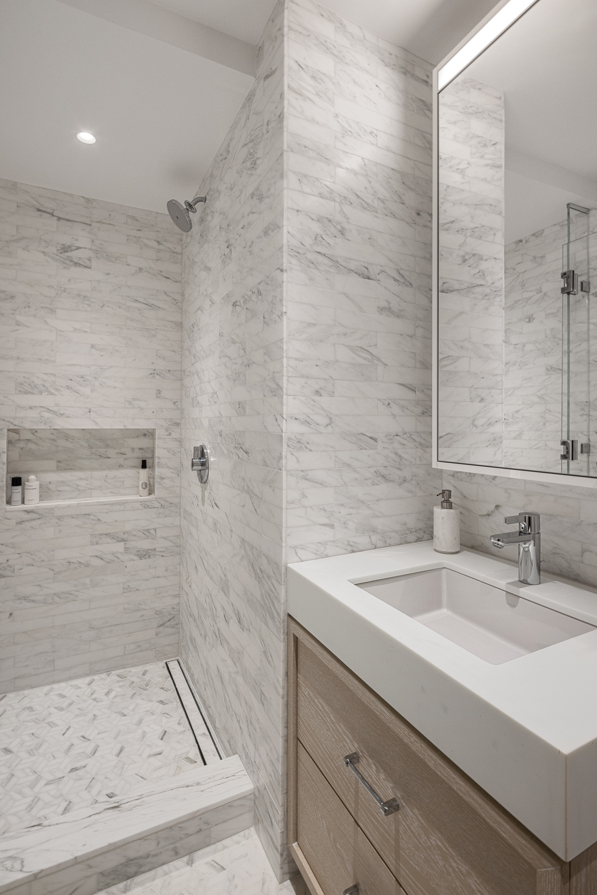 250 West 96th Street, Unit 19D Manhattan, NY 10025 - Photo 13 of 34 a bathroom with a sink and a shower