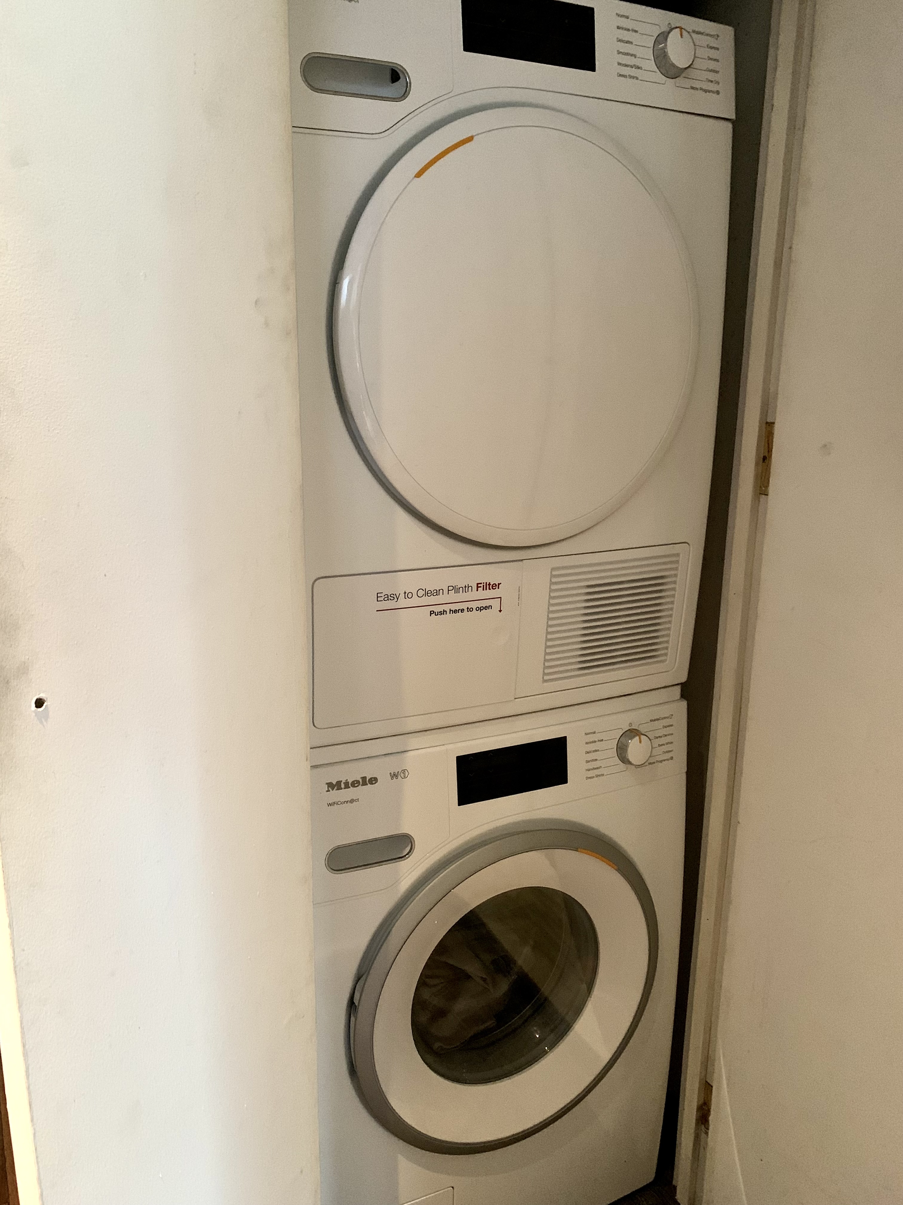 130 Barrow Street, Unit PH508 Manhattan, NY 10014 - Photo 14 of 14 a utility room with dryer and washer