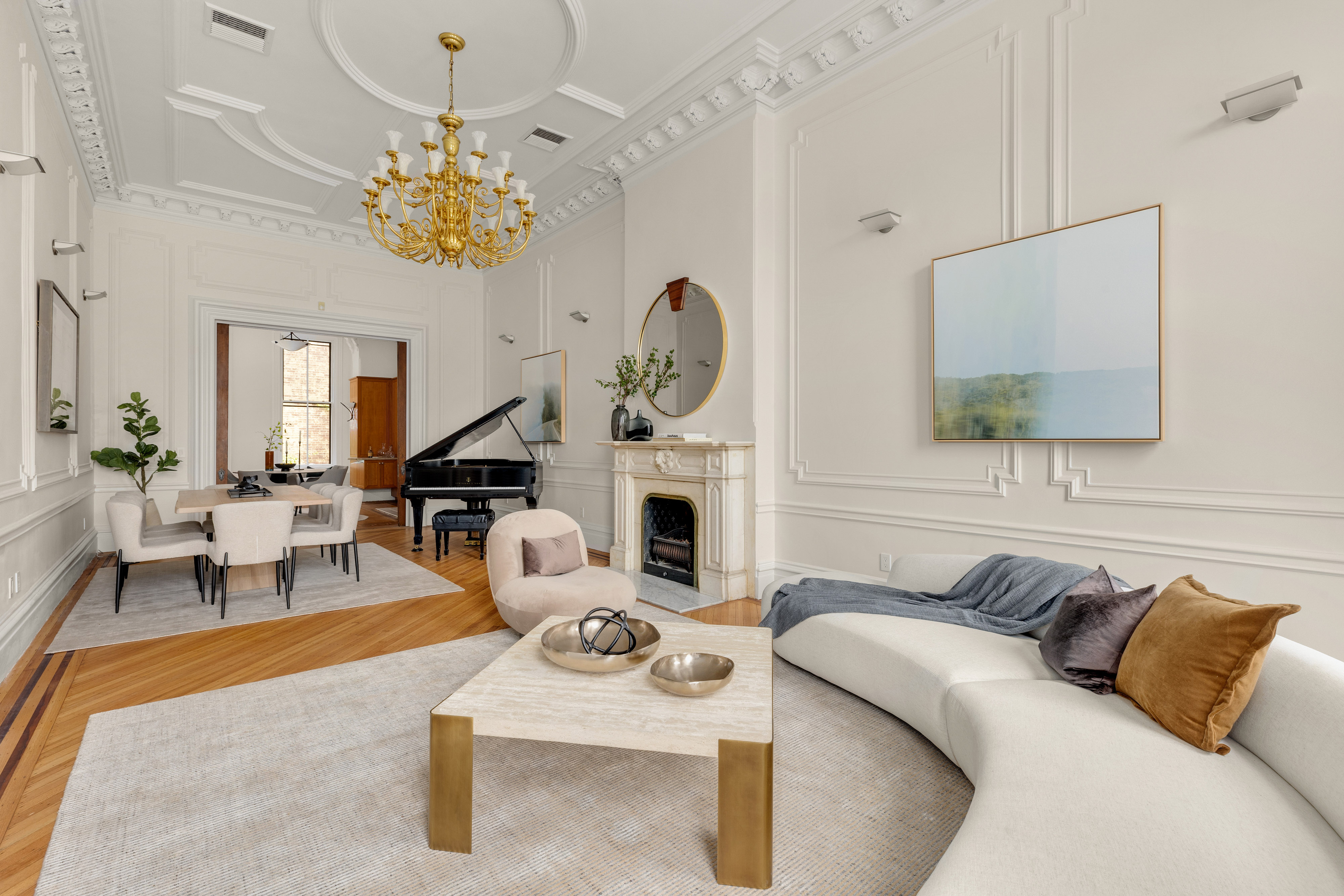 75 Columbia Heights Brooklyn, NY 11201 - Photo 3 of 28 a living room with furniture chandelier and a fireplace