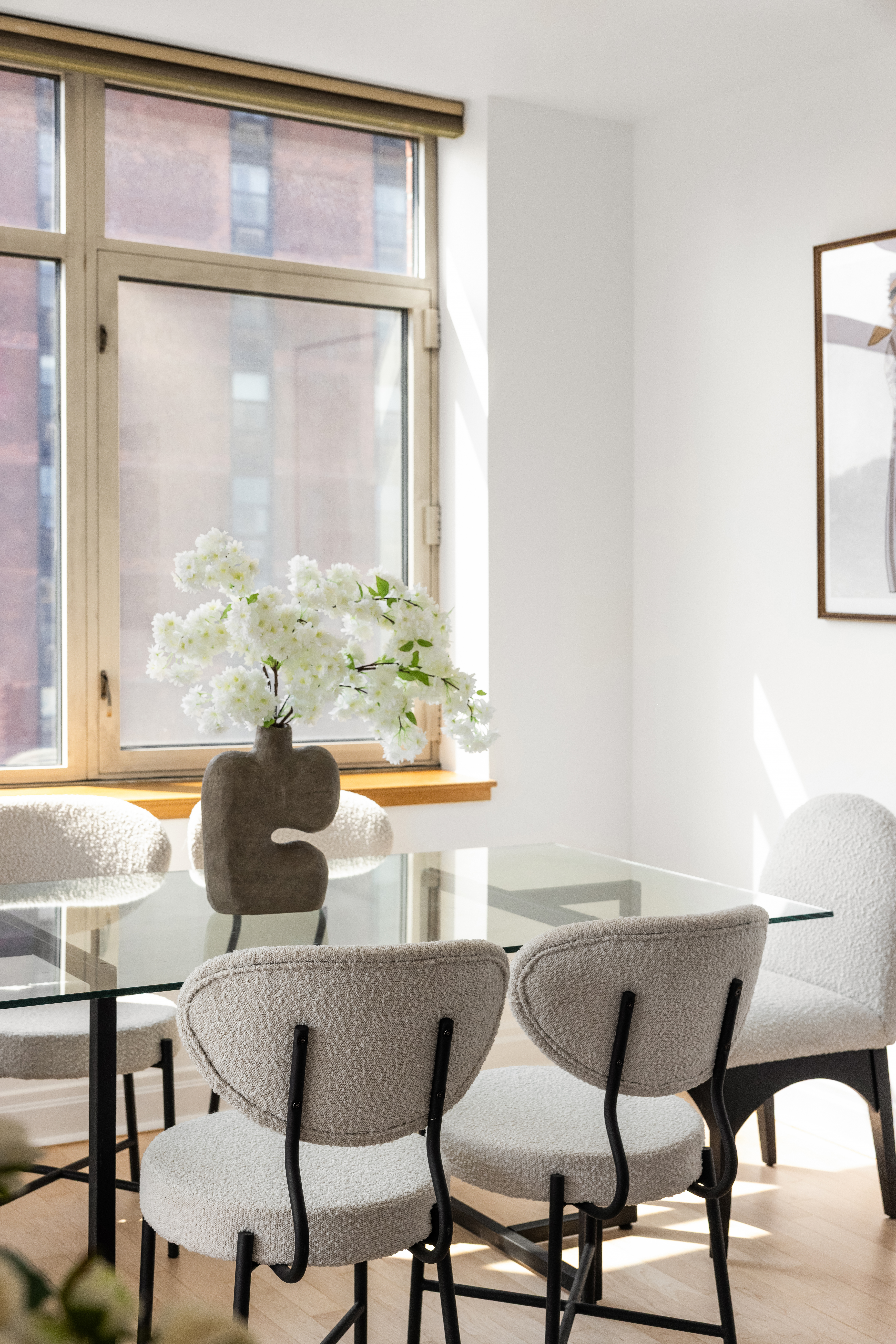1760 2nd Avenue, Unit 30C Manhattan, NY 10128 - Photo 4 of 21 a view of a dining room with furniture and a window