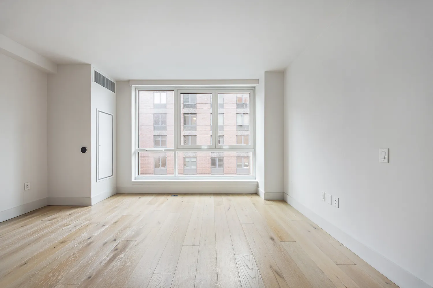 a bathroom with a white toilet