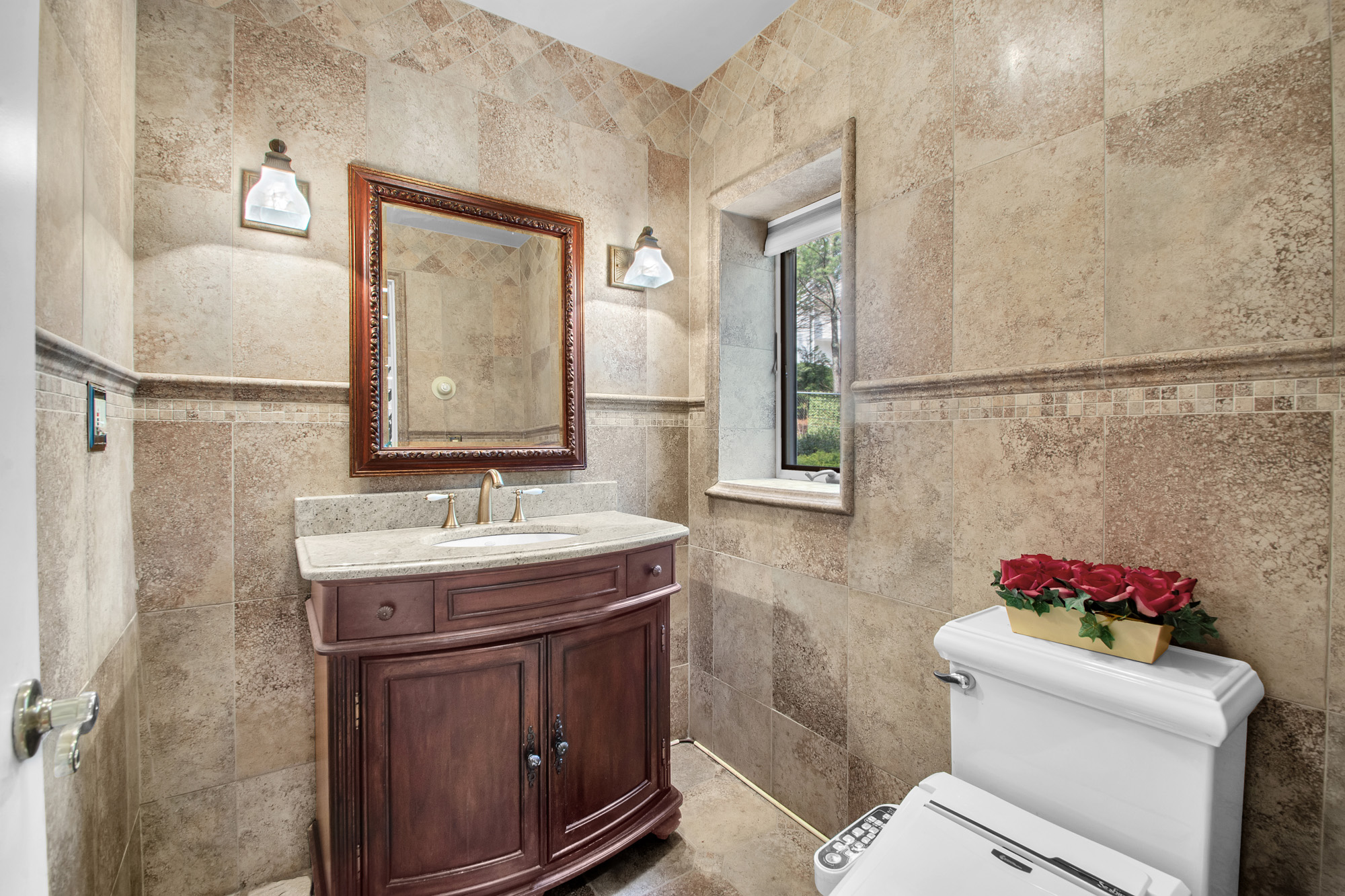68 Circle Road Staten Island, NY 10304 - Photo 13 of 38 a bathroom with a granite countertop sink mirror and toilet