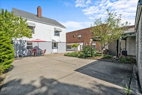 a view of a house with a patio