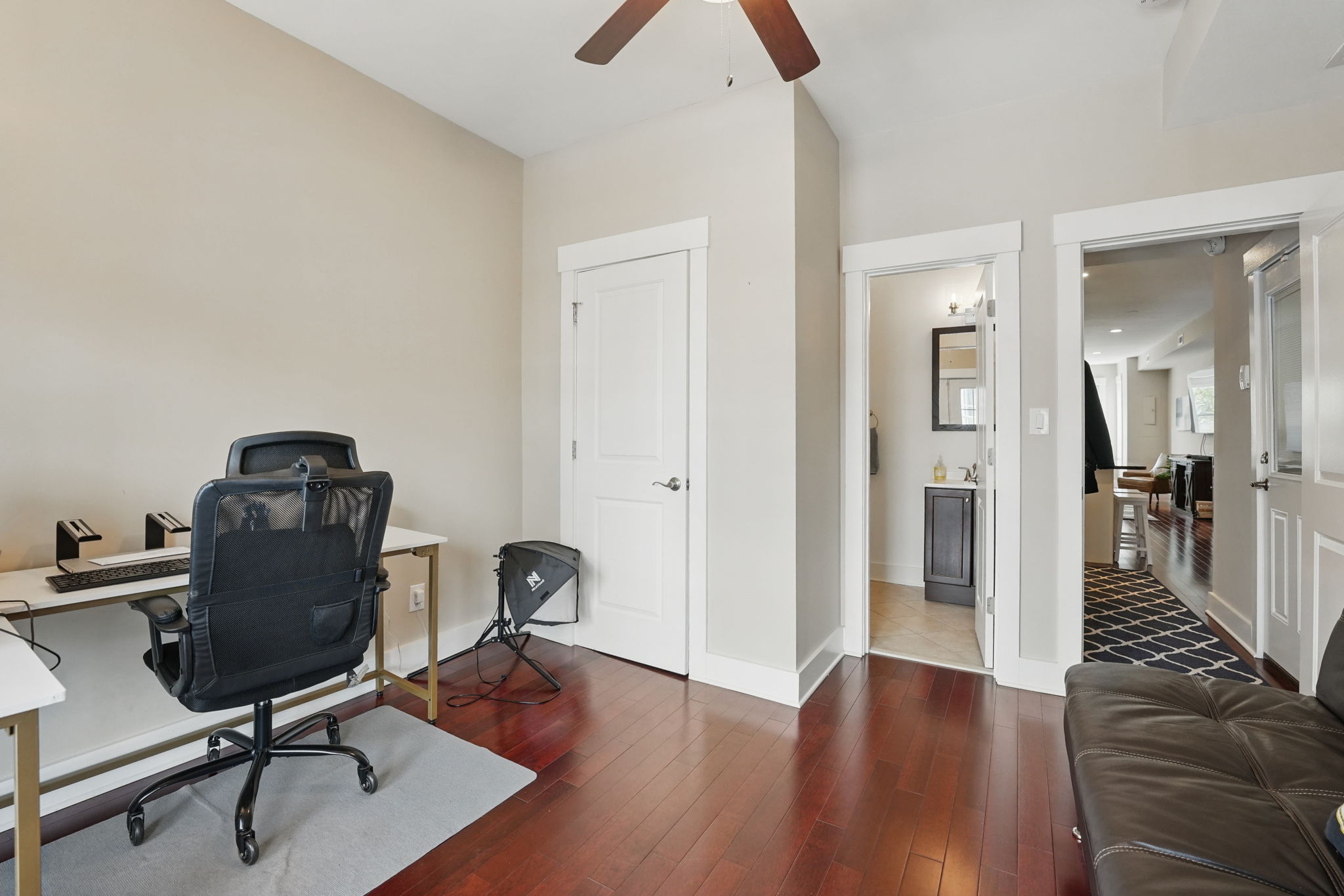 28 Q Street Northeast, Unit 2 Washington, DC 20002 - Photo 15 of 41 a view of a workspace with furniture and wooden floor