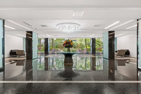 a view of a backyard with sitting area