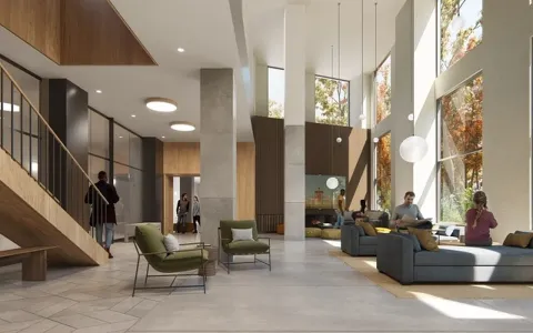 a living room with fireplace furniture and floor to ceiling windows