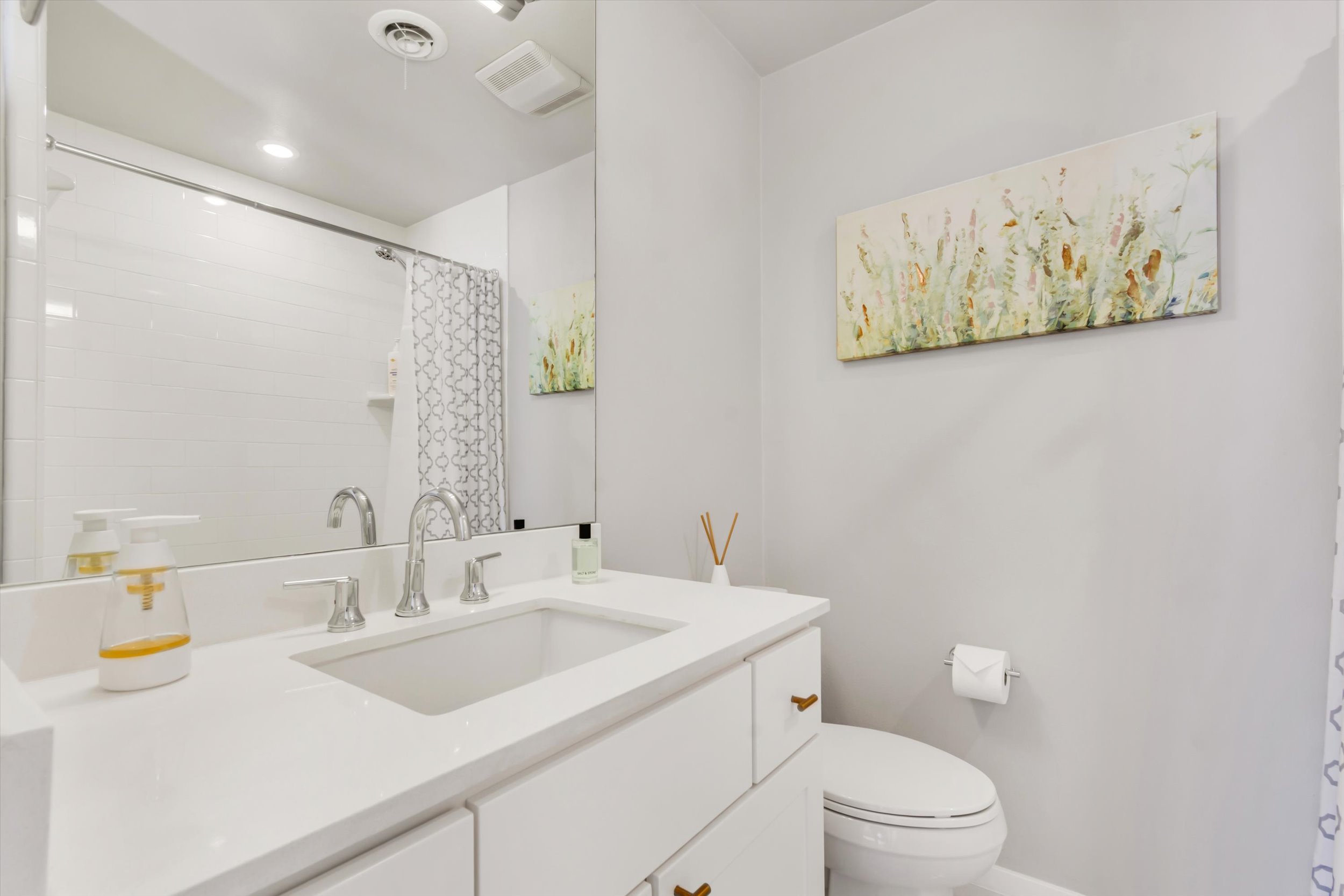 3601 Las Colinas Drive, Unit C Austin, TX 78731 - Photo 7 of 33 a bathroom with a toilet sink and mirror