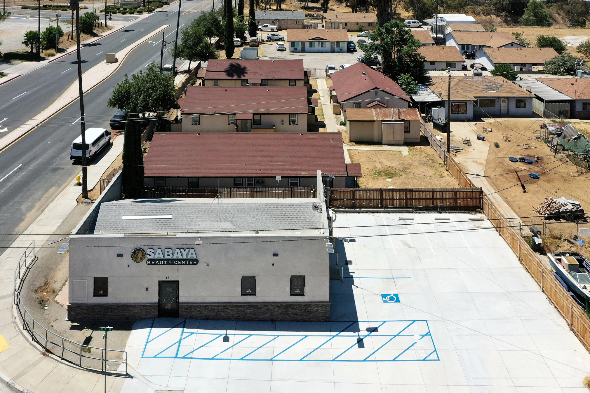 451 Iowa Avenue Riverside, CA 92507 - Photo 2 of 13 an aerial view of a house with a yard