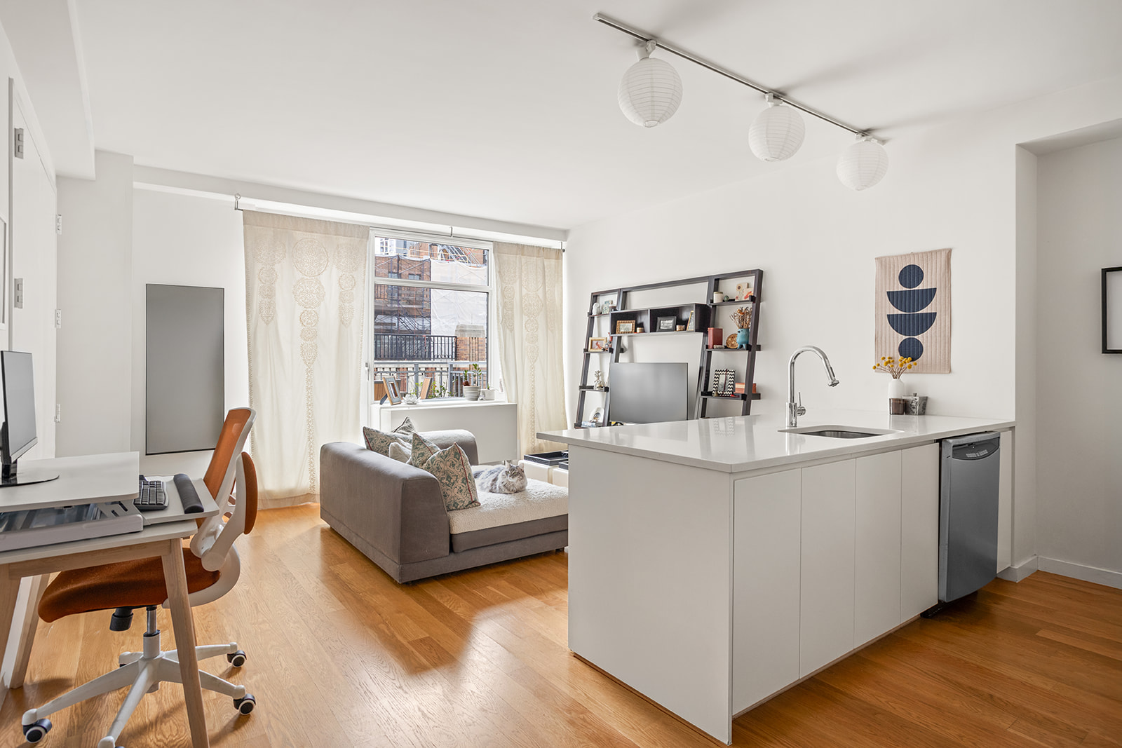189 Schermerhorn Street, Unit 16G Brooklyn, NY 11201 - Photo 3 of 15 a living room with furniture and large windows