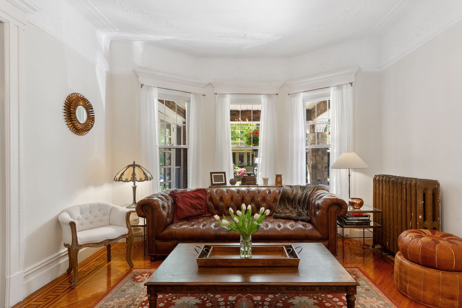 685 East 22nd Street Brooklyn, NY 11210 - Photo 6 of 43 a living room with furniture and a window