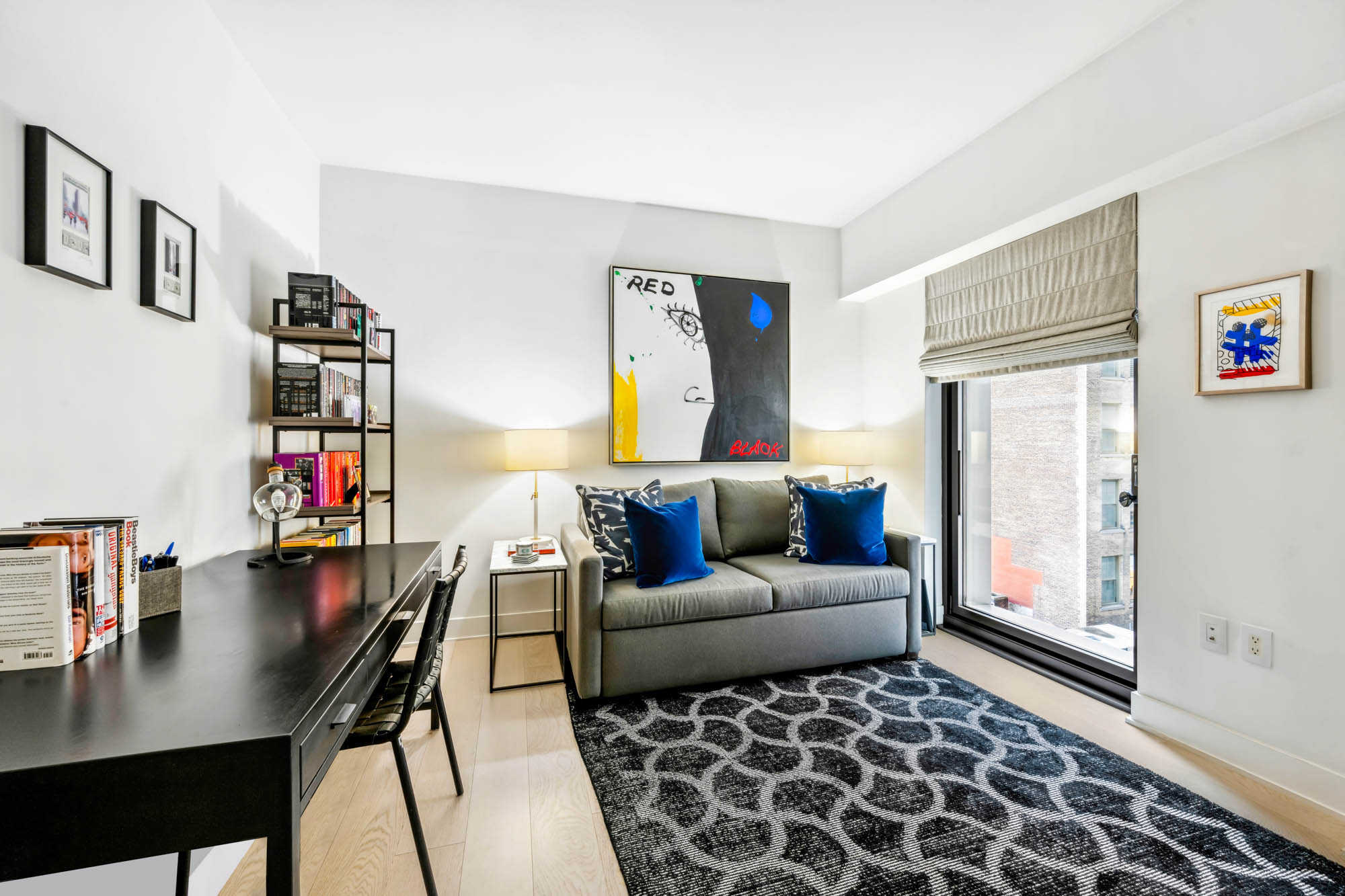 55 West 17th Street, Unit 701 Manhattan, NY 10011 - Photo 9 of 20 a living room with furniture and a couch