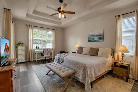 a bathroom with a sink vanity and a mirror