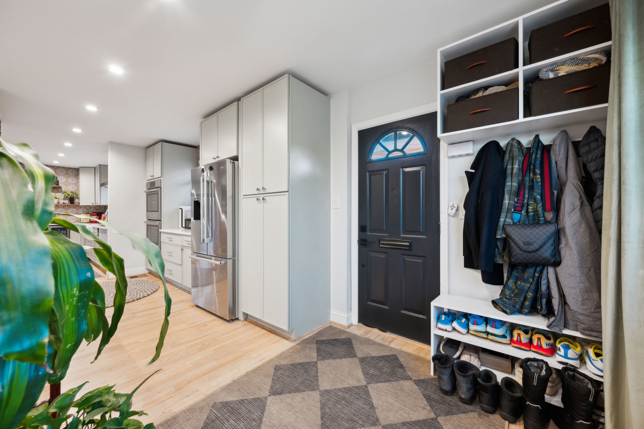 2607 Ross Road Chevy Chase, MD 20815 - Photo 23 of 37 a view of walk in closet with clothes and shoes
